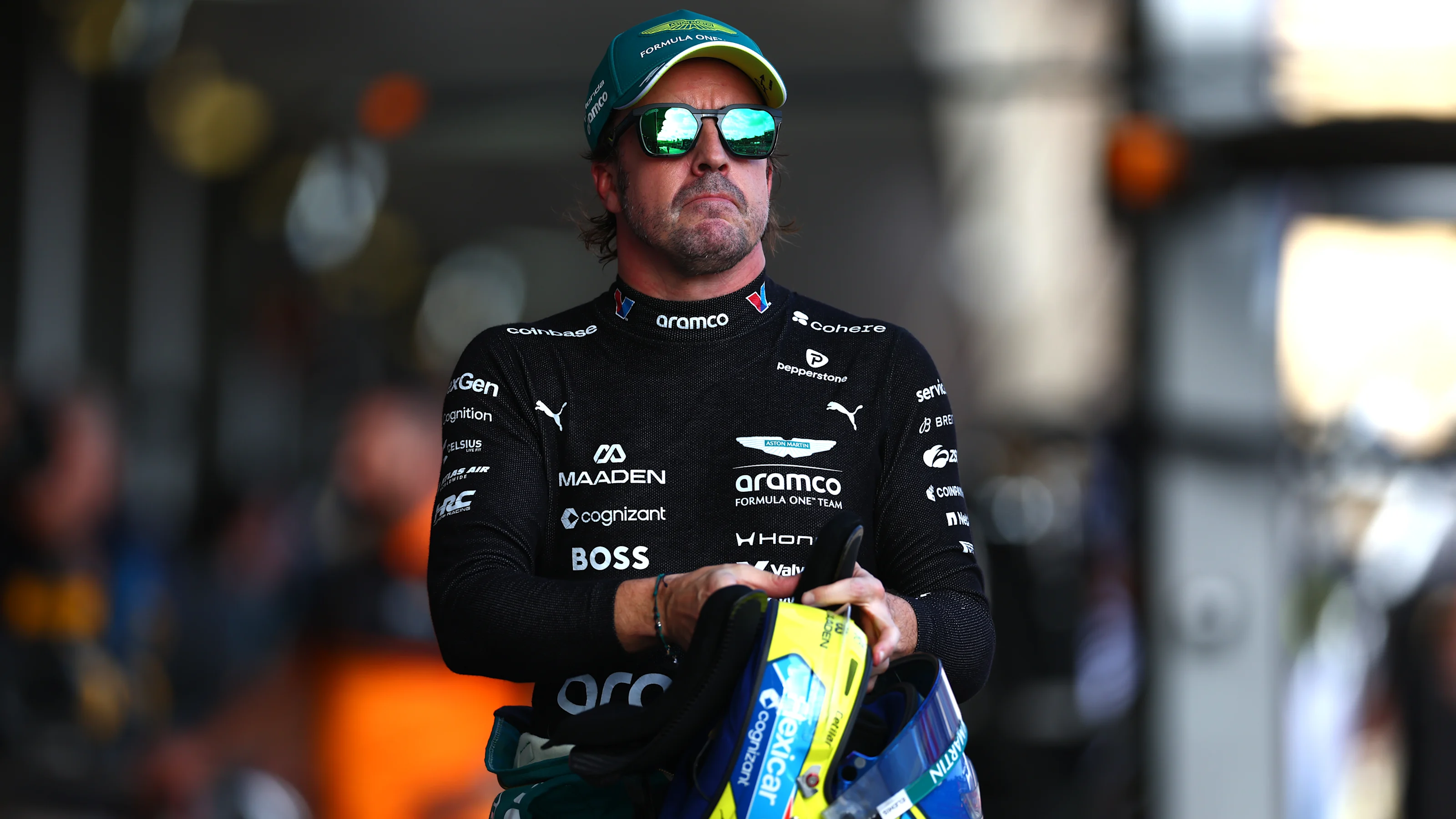 BAKU, AZERBAIJAN - SEPTEMBER 25: Nineteenth placed qualifier Fernando Alonso of Spain and Aston