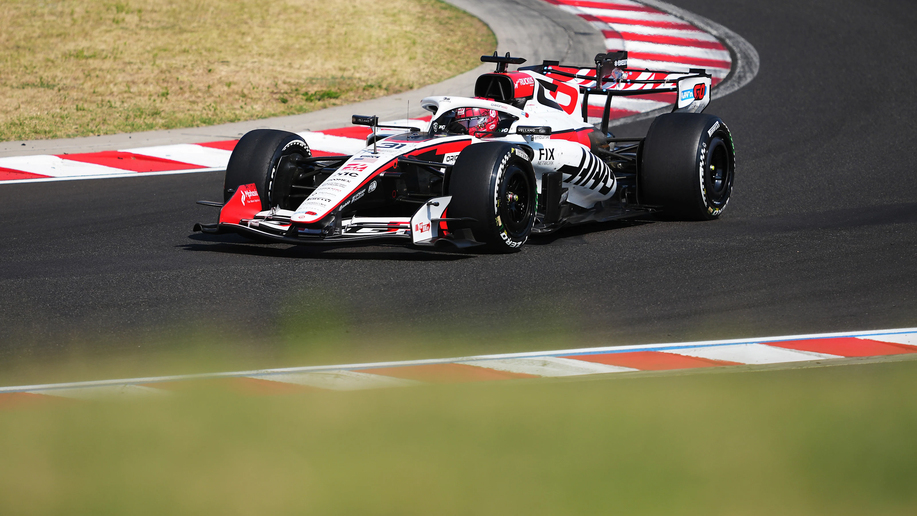 BUDAPEST, HUNGARY - JULY 26: Esteban Ocon of France driving the (31) Haas F1 VF-26 Ferrari on track