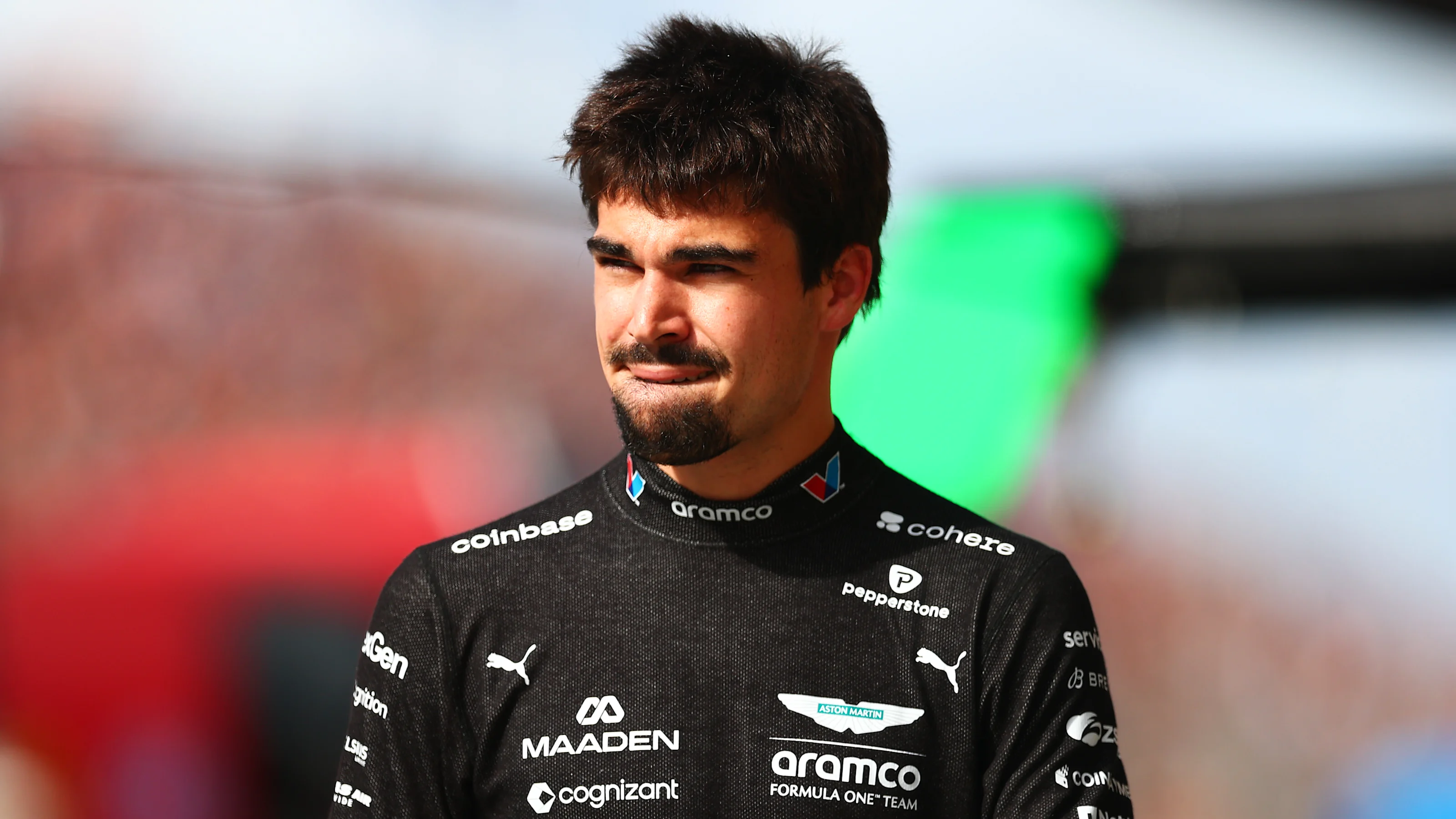 ZANDVOORT, NETHERLANDS - AUGUST 21: Lance Stroll of Canada and Aston Martin F1 Team looks on in the