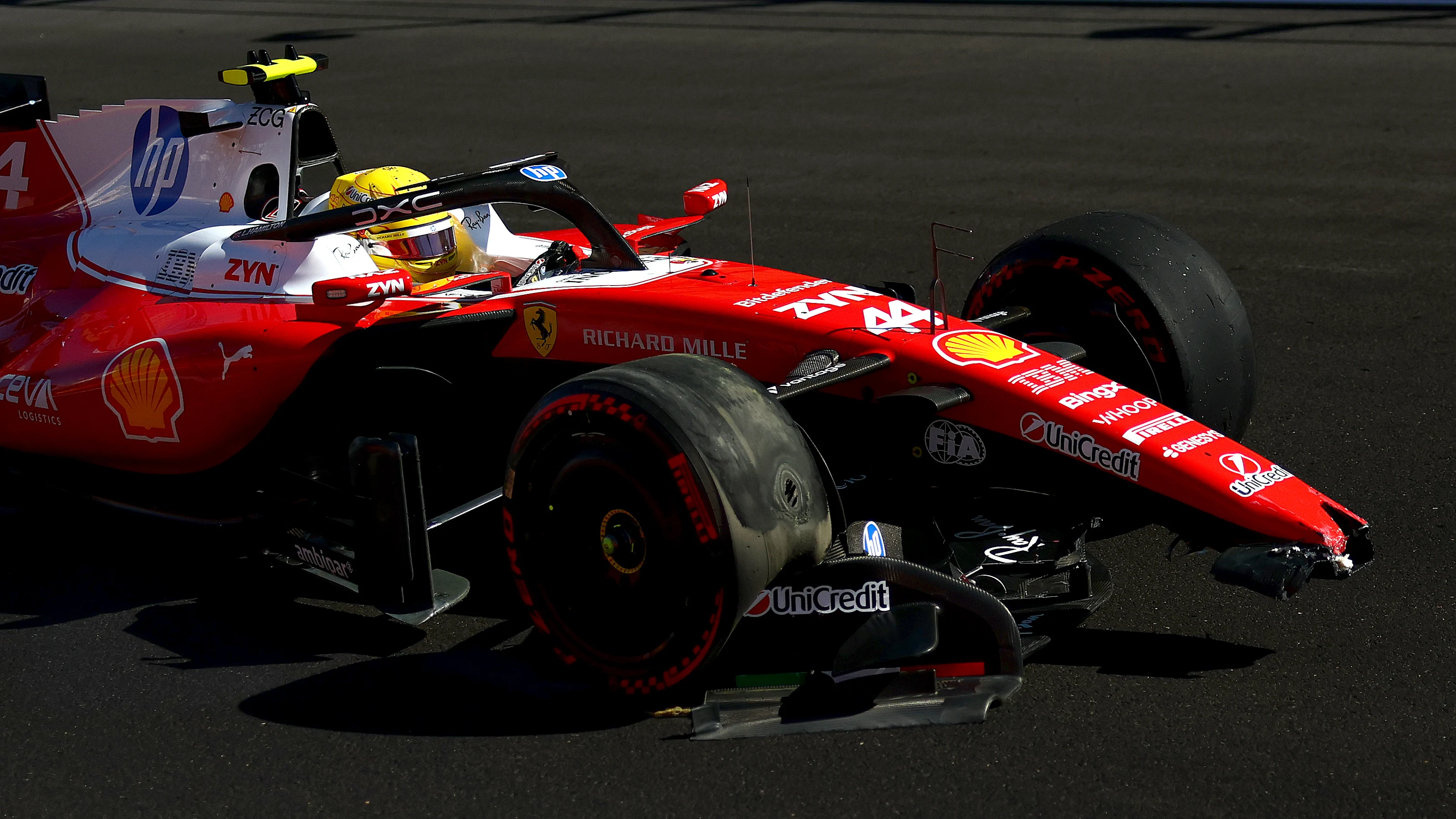 MADRID, SPAIN - SEPTEMBER 12: Lewis Hamilton of Great Britain driving the (44) Scuderia Ferrari