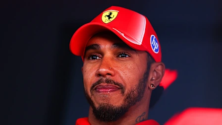 BUDAPEST, HUNGARY - JULY 23: Lewis Hamilton of Great Britain and Scuderia Ferrari talks to the