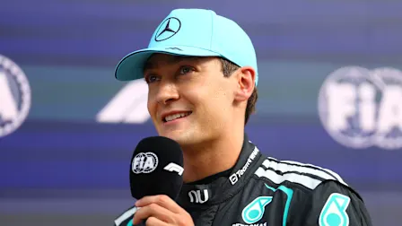ZANDVOORT, NETHERLANDS - AUGUST 21: Sprint Pole qualifier George Russell of Great Britain and