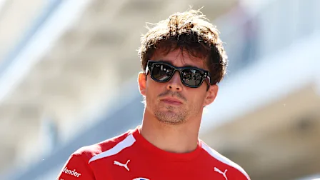 AUSTIN, TEXAS - OCTOBER 23: Charles Leclerc of Monaco and Scuderia Ferrari walks in the Paddock