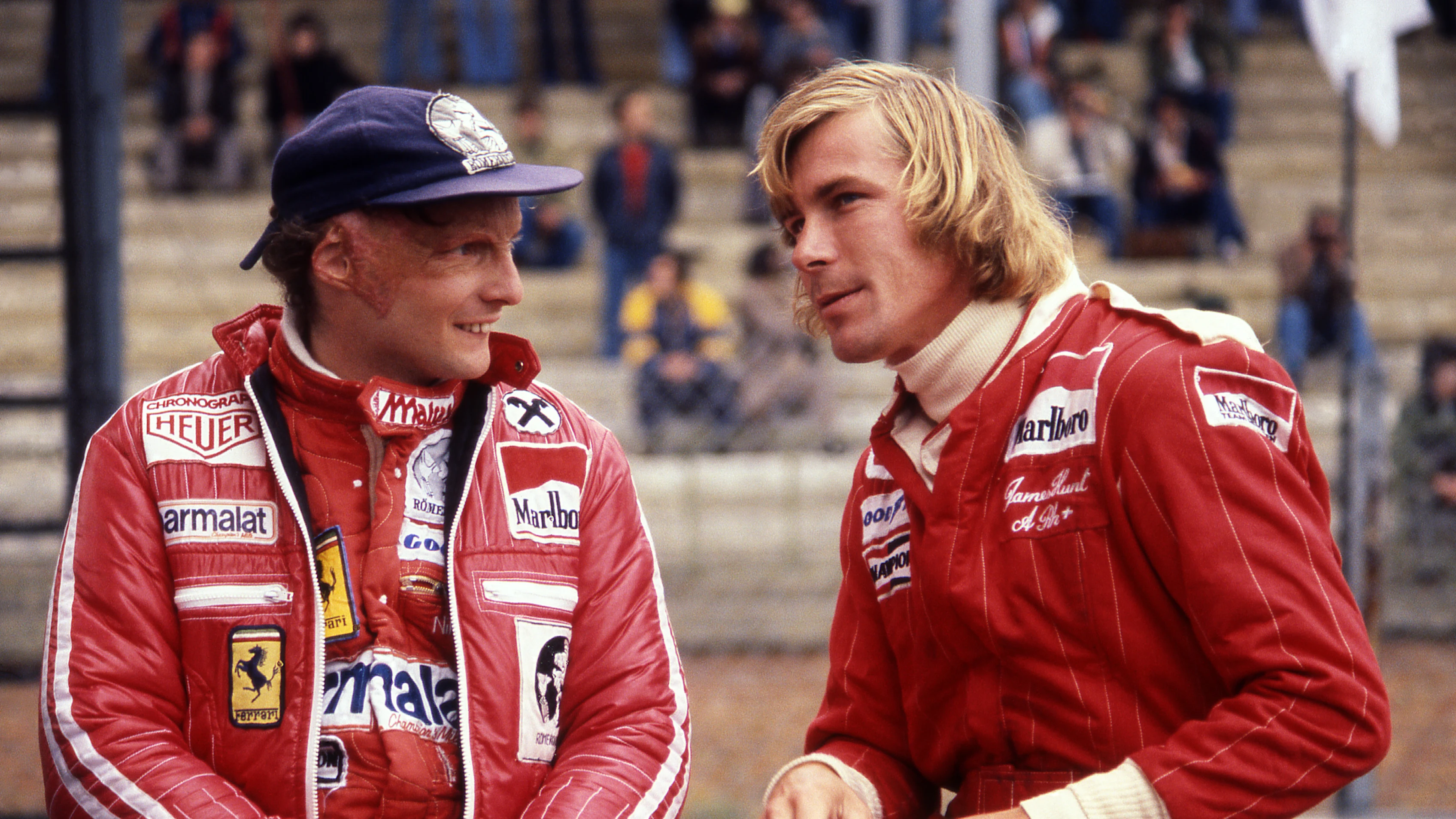 Niki Lauda of Ferrari alongside James Hunt of McLaren during their Formula 1 rivalry