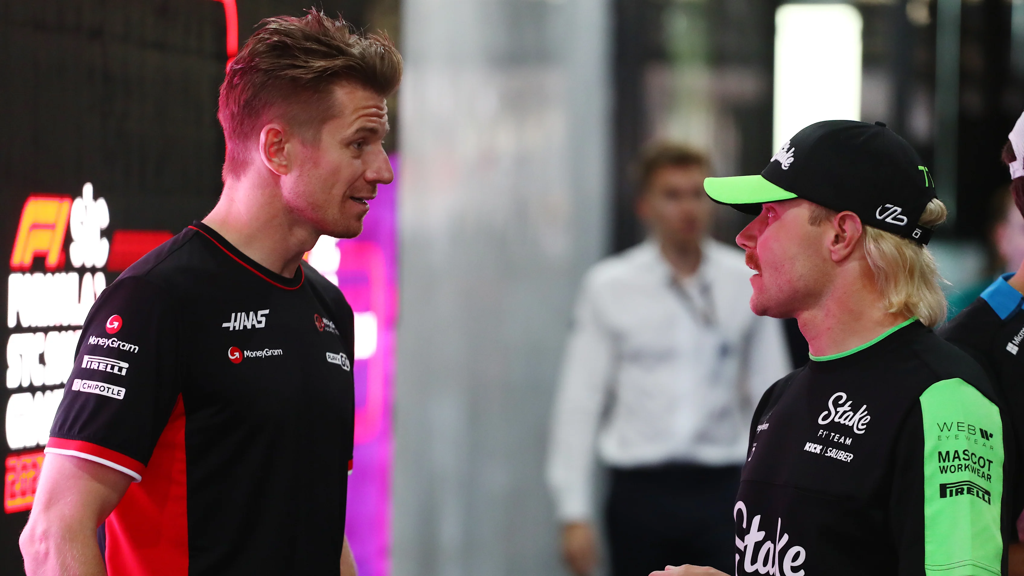 JEDDAH, SAUDI ARABIA - MARCH 09: Nico Hulkenberg of Germany and Haas F1 and Valtteri Bottas of