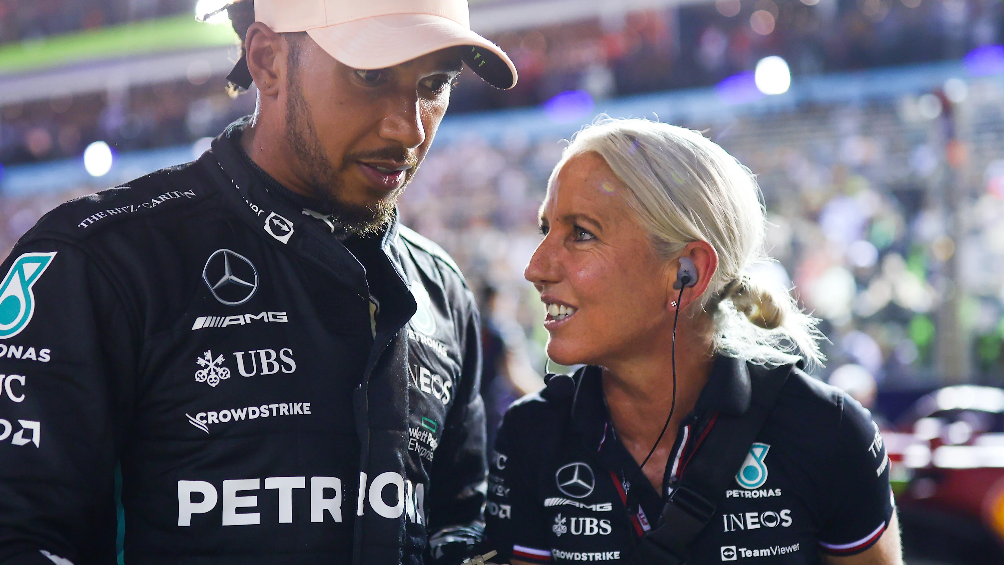 SINGAPORE, SINGAPORE - OCTOBER 01: Third placed qualifier Lewis Hamilton of Great Britain and