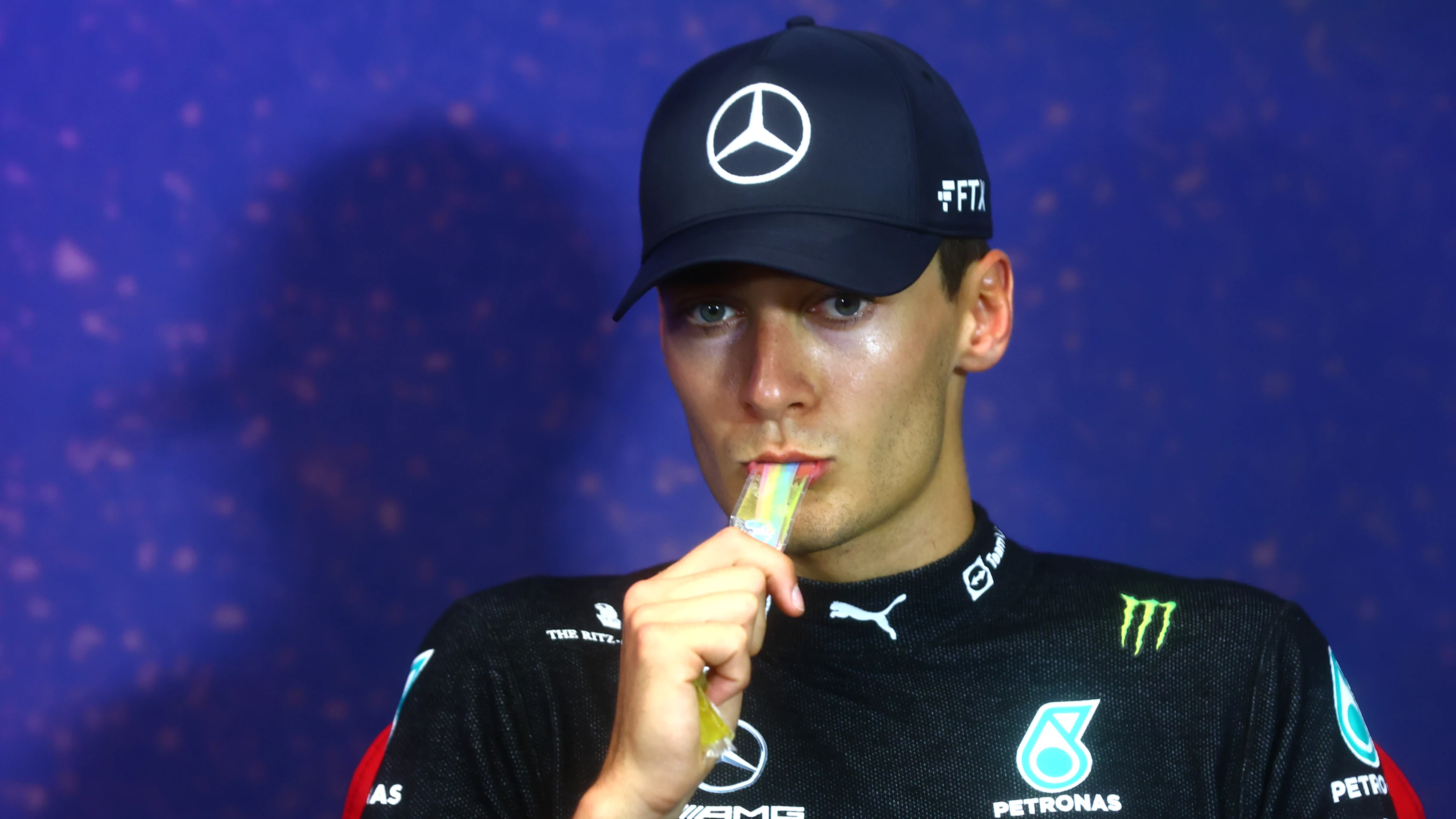 LE CASTELLET, FRANCE - JULY 24: Third placed George Russell of Great Britain and Mercedes eats an