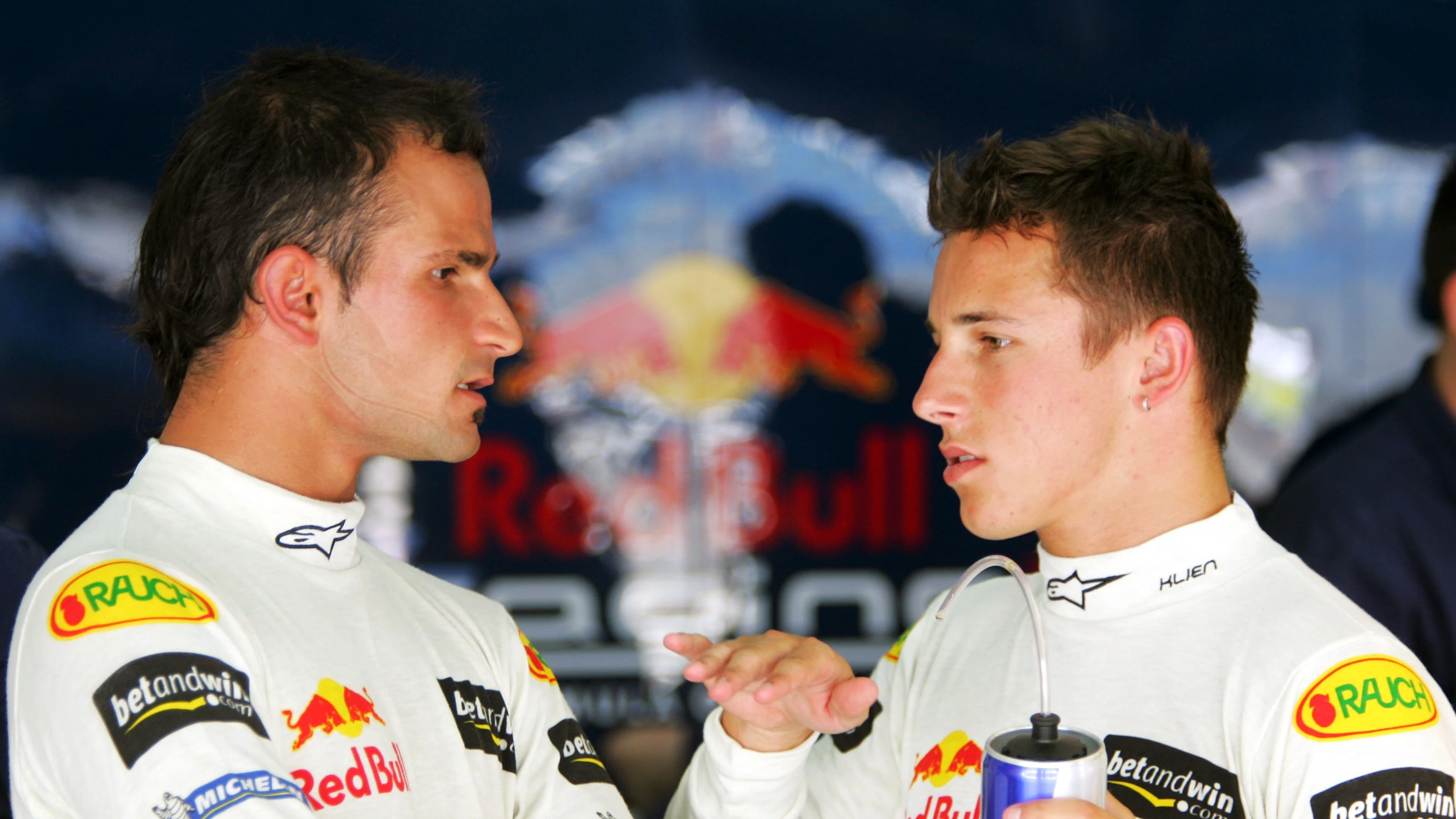 (L to R): Vitantonio Liuzzi (ITA) Red Bull Racing Third Driver talks with Christian Klien (AUT) Red