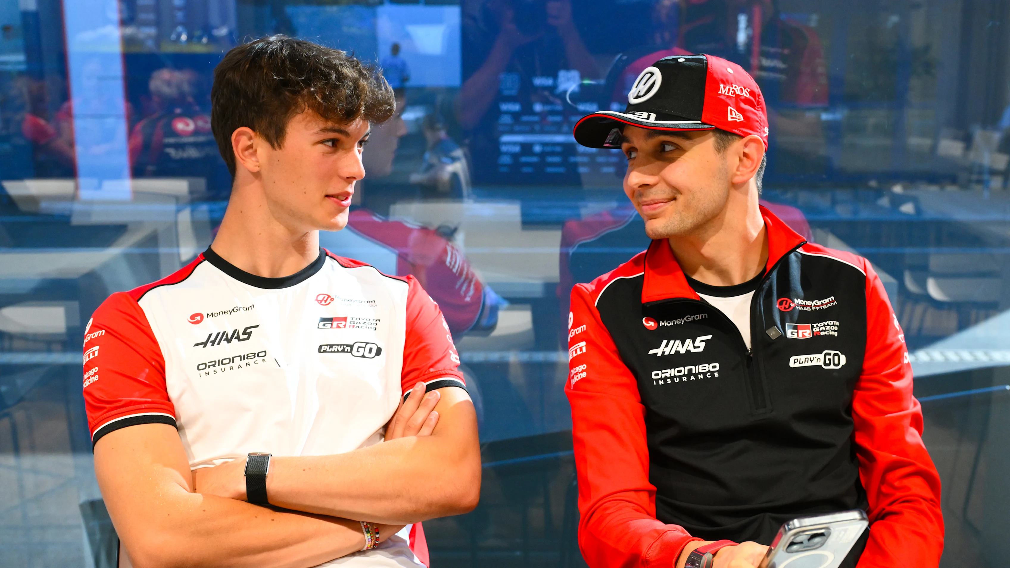 BUDAPEST, HUNGARY - JULY 31: Oliver Bearman of Great Britain and Haas F1 with Esteban Ocon of