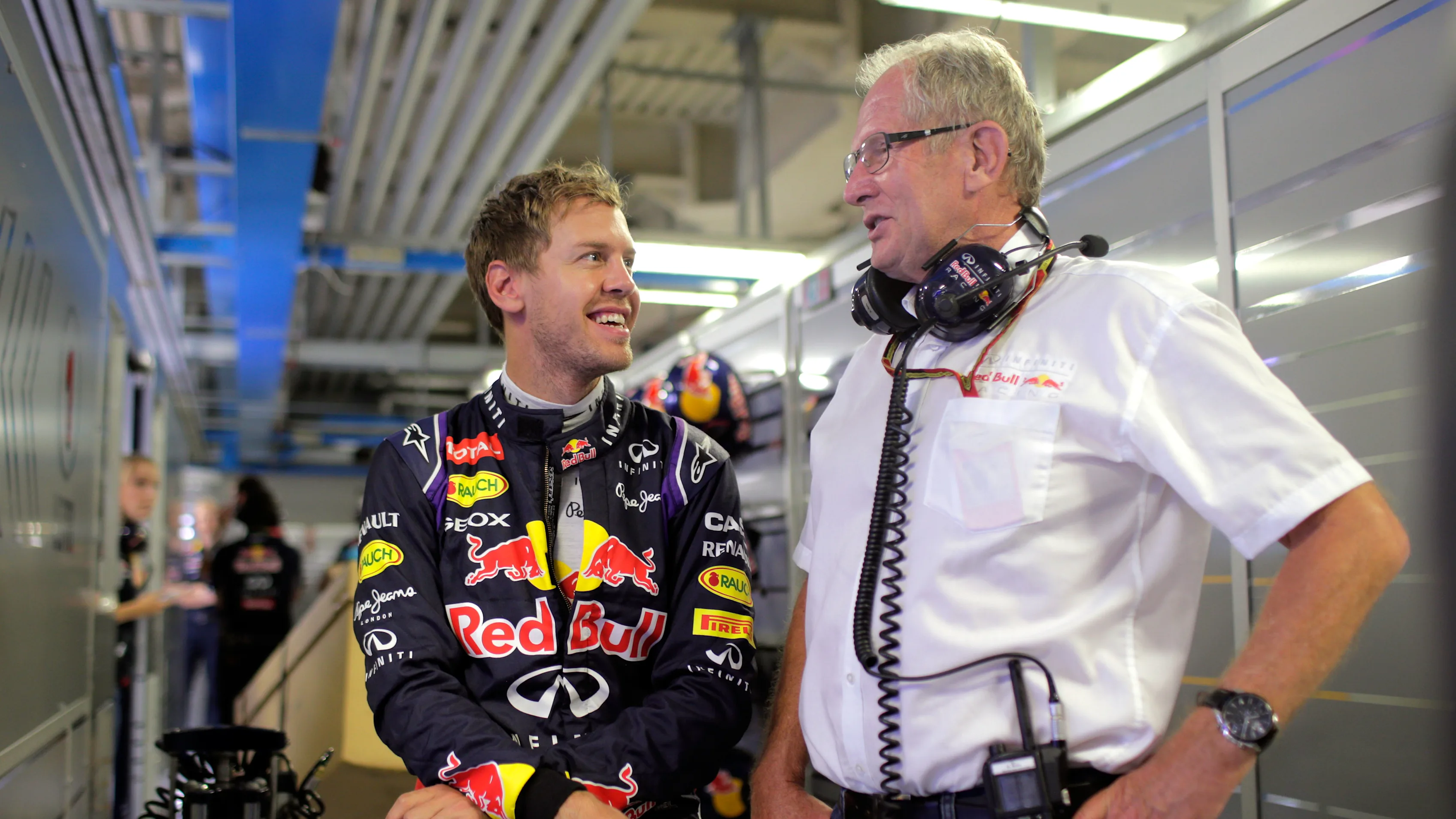 MONZA, ITALY - SEPTEMBER 05: Sebastian Vettel of Germany and Infiniti Red Bull Racing speaks with