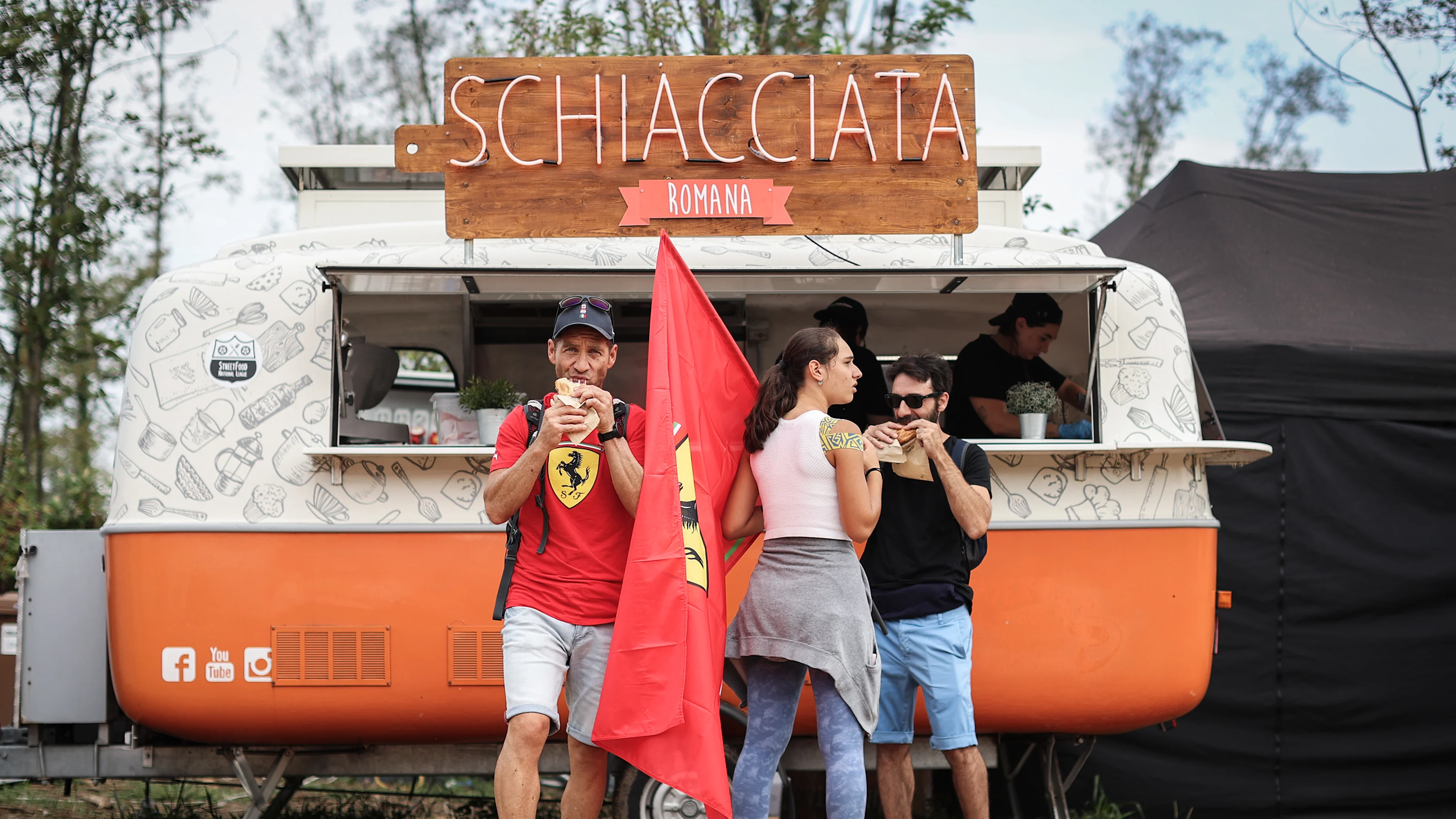 MONZA, ITALY - SEPTEMBER 02: Ferrari fans buy food before final practice ahead of the F1 Grand Prix