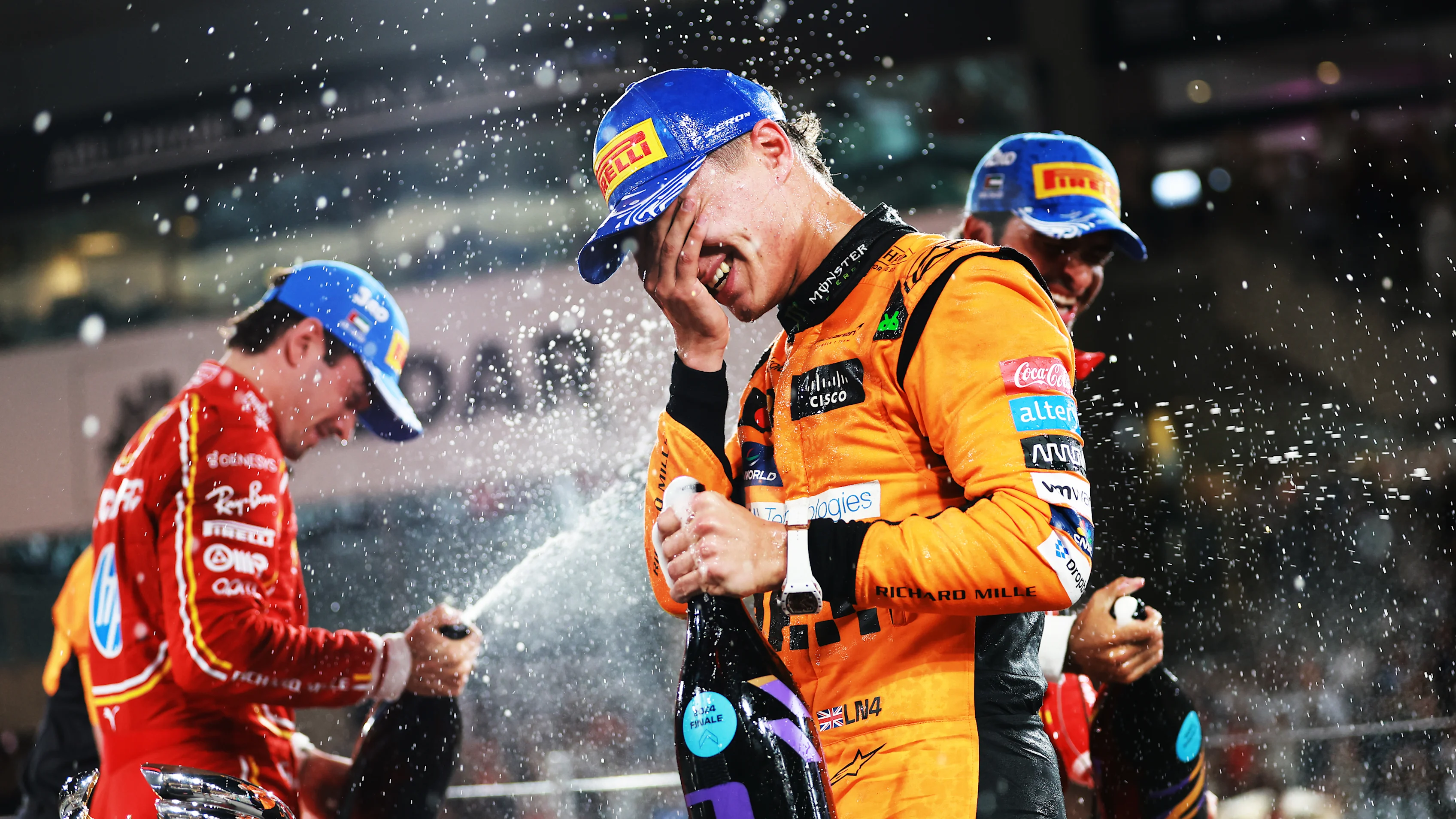 ABU DHABI, UNITED ARAB EMIRATES - DECEMBER 08: Race winner Lando Norris of Great Britain and