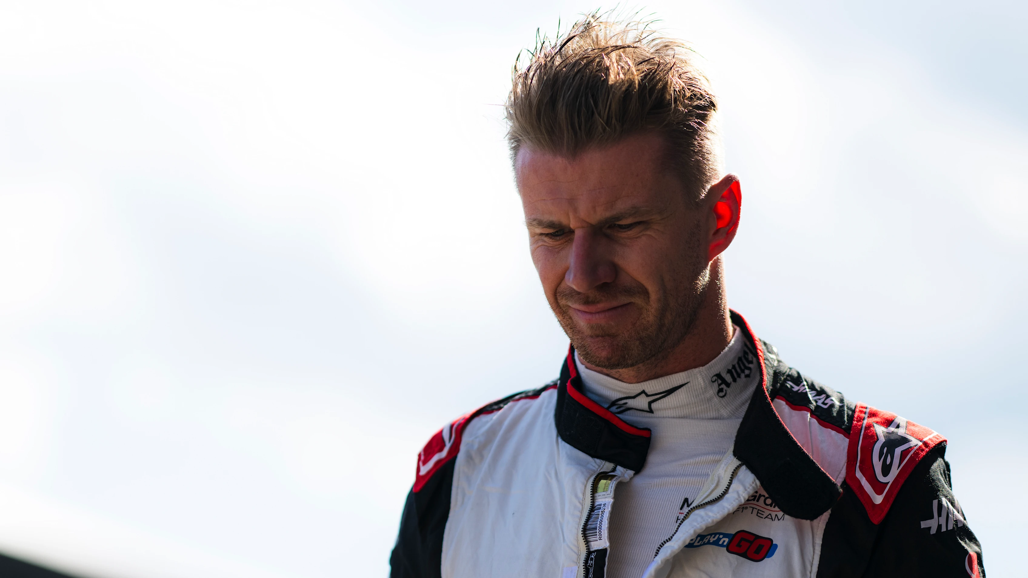 SPIELBERG, AUSTRIA - JUNE 28: 17th placed qualifier Nico Hulkenberg of Germany and Haas F1 walks in