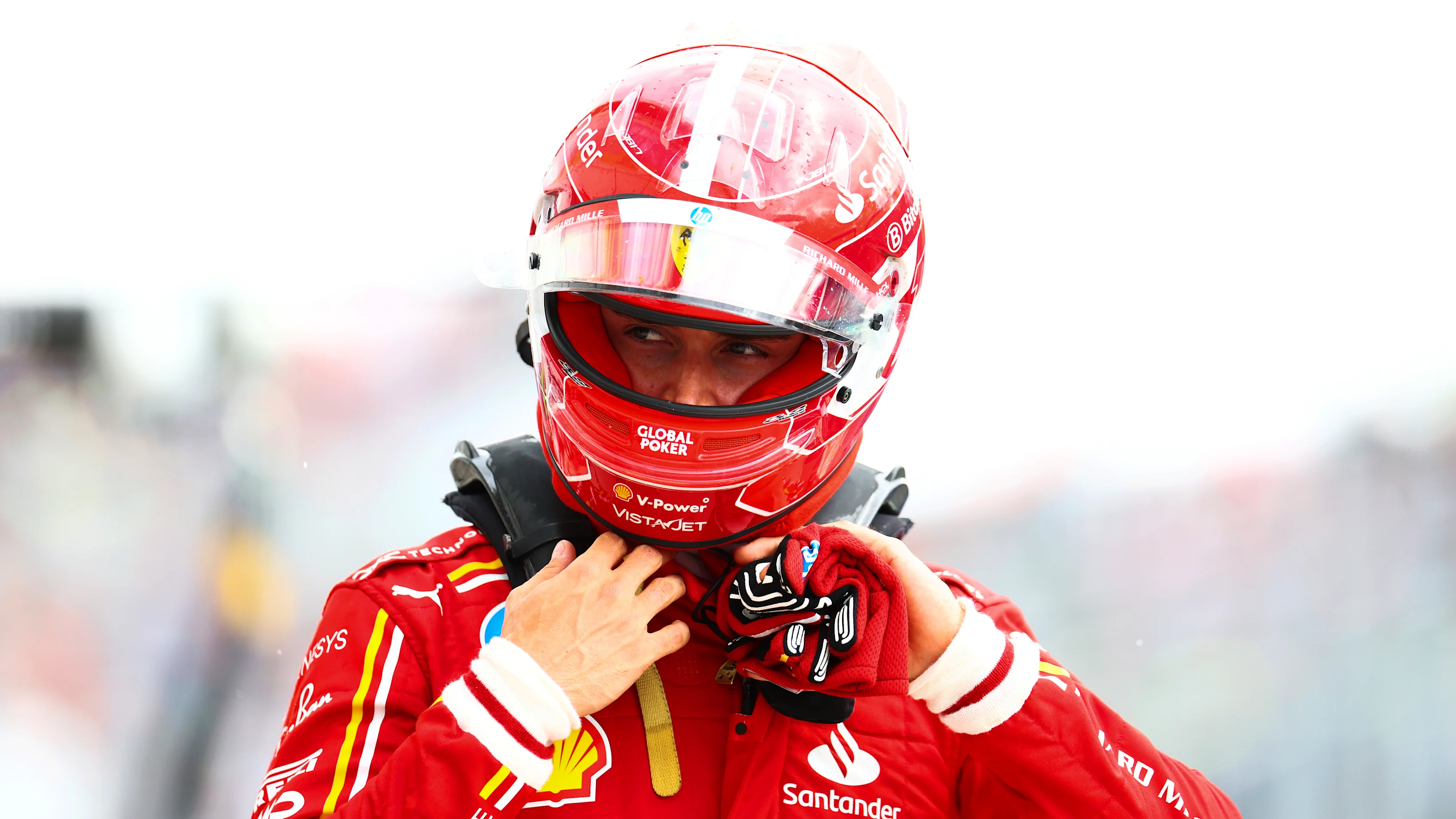 MONTREAL, QUEBEC - JUNE 08: 11th placed qualifier Charles Leclerc of Monaco and Ferrari walks in