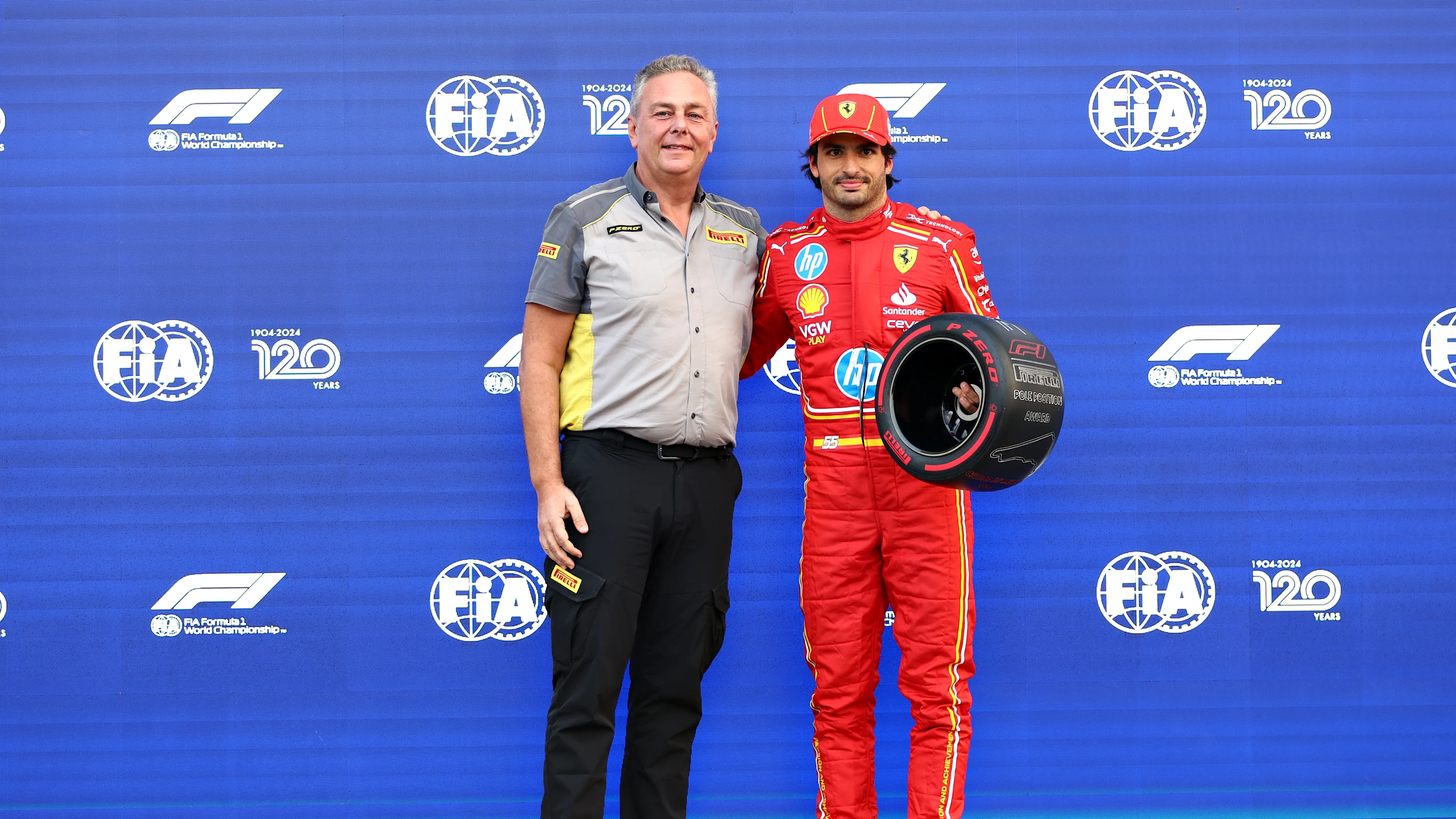 MEXICO CITY, MEXICO - OCTOBER 26: Pole position qualifier Carlos Sainz of Spain and Ferrari is