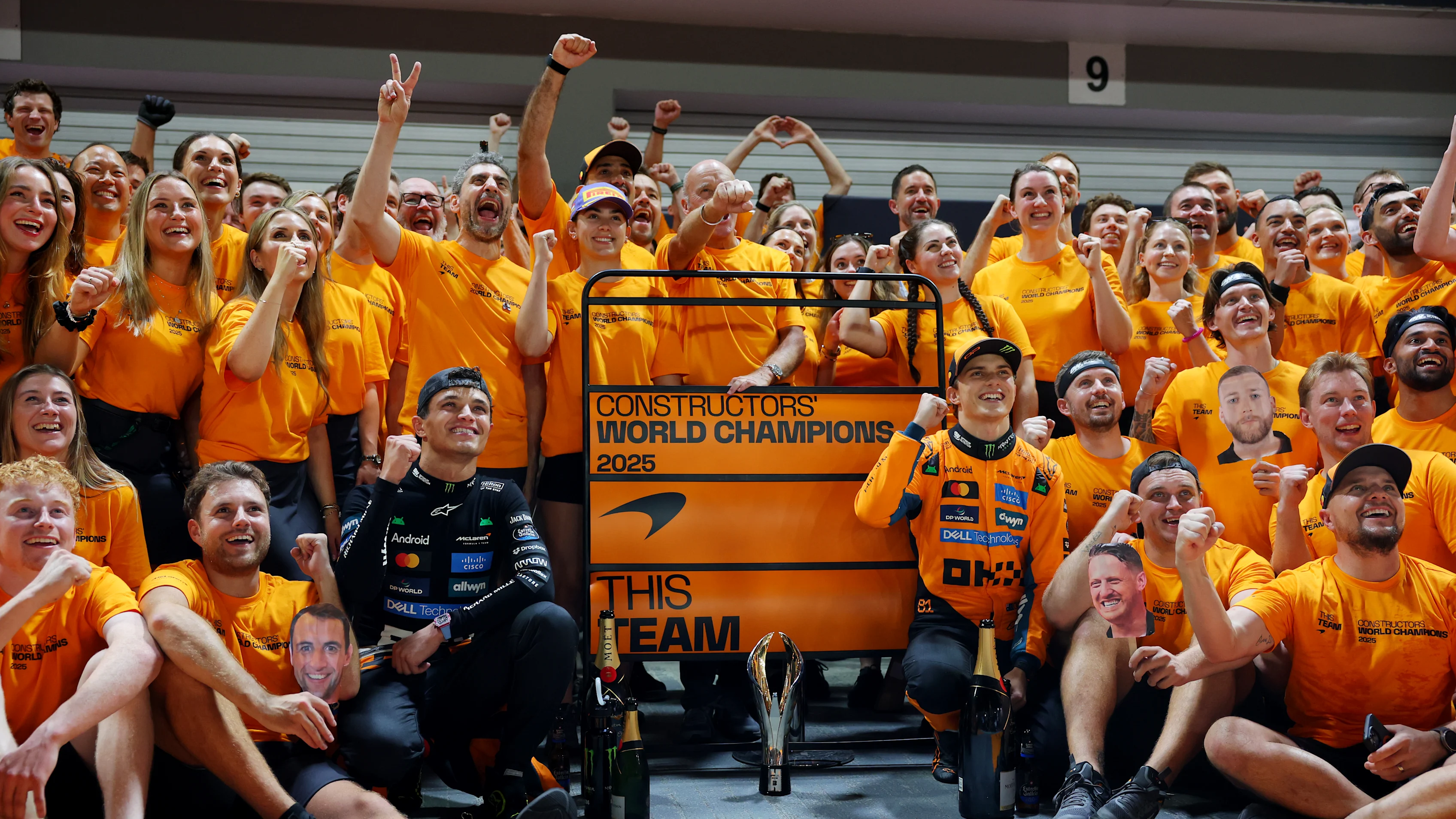 SINGAPORE, SINGAPORE - OCTOBER 05: Lando Norris of Great Britain and McLaren Oscar Piastri of