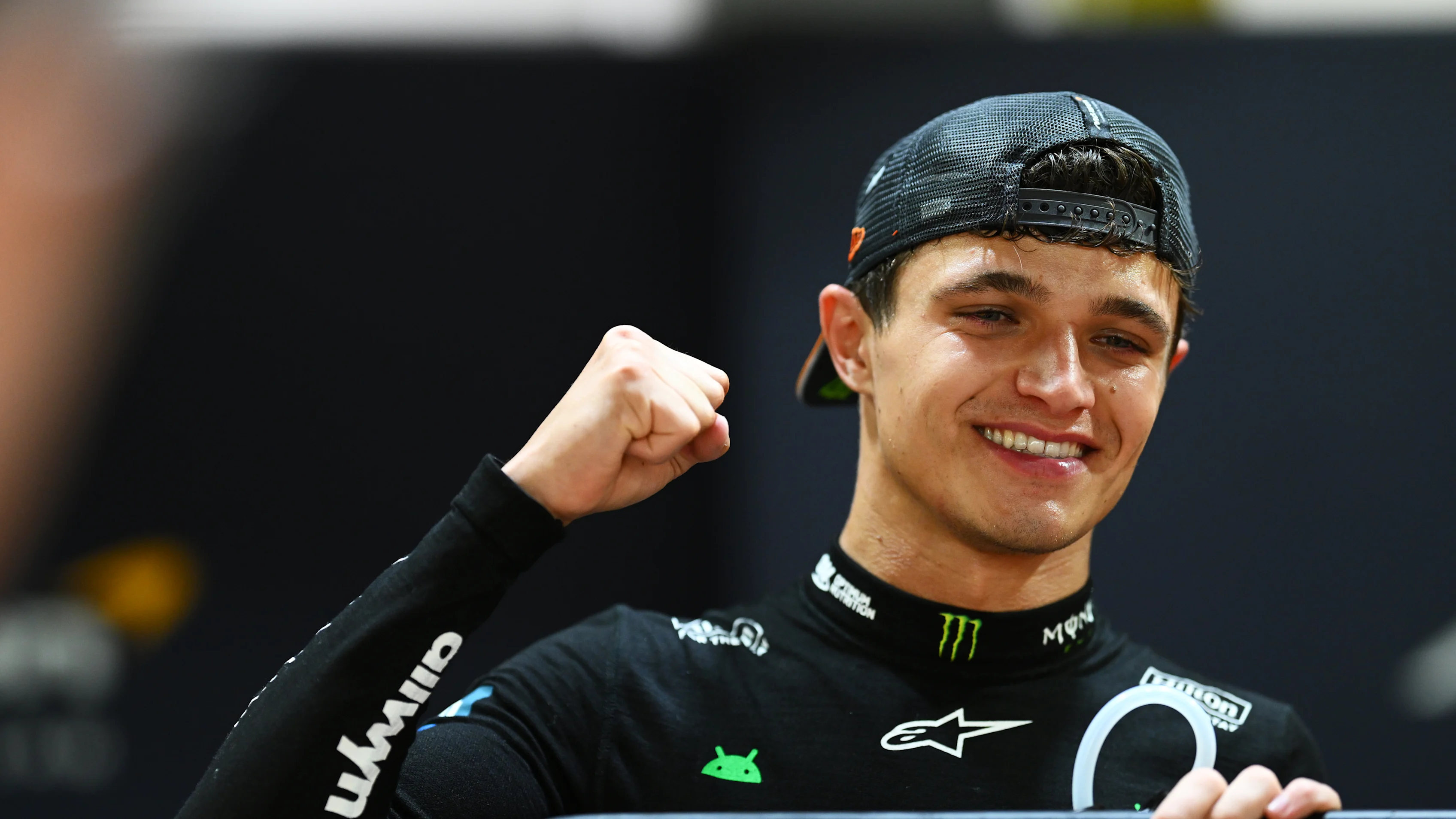 SINGAPORE, SINGAPORE - OCTOBER 05: Lando Norris of Great Britain and McLaren celebrates with his