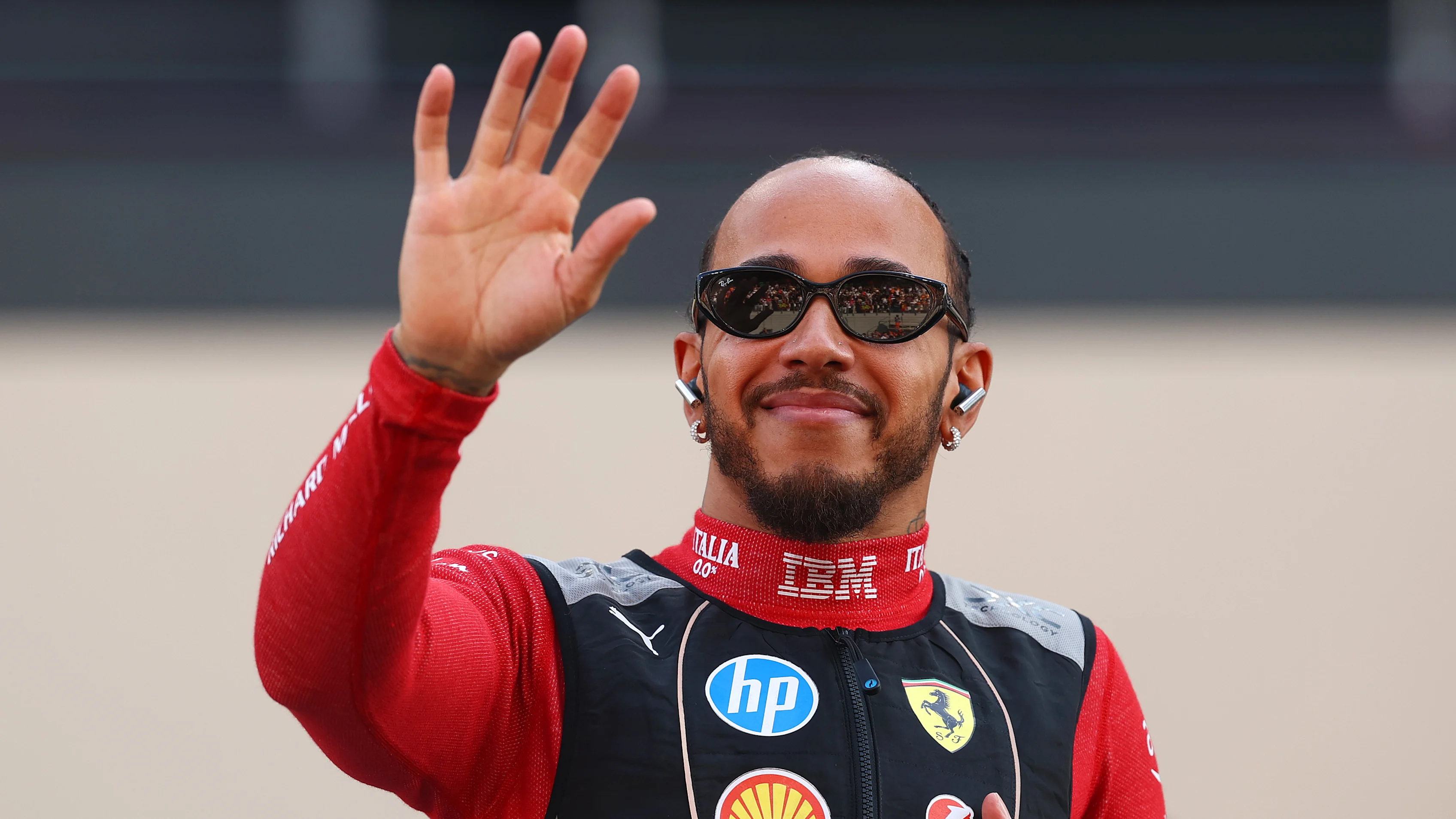 ABU DHABI, UNITED ARAB EMIRATES - DECEMBER 07: Lewis Hamilton of Great Britain and Scuderia Ferrari