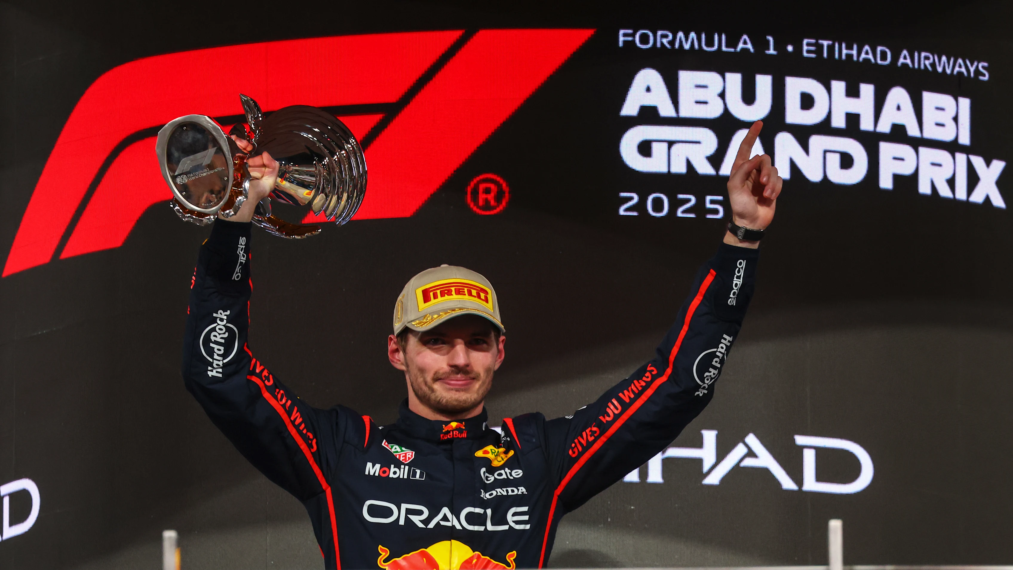ABU DHABI, UNITED ARAB EMIRATES - DECEMBER 07: Race winner Max Verstappen of the Netherlands and