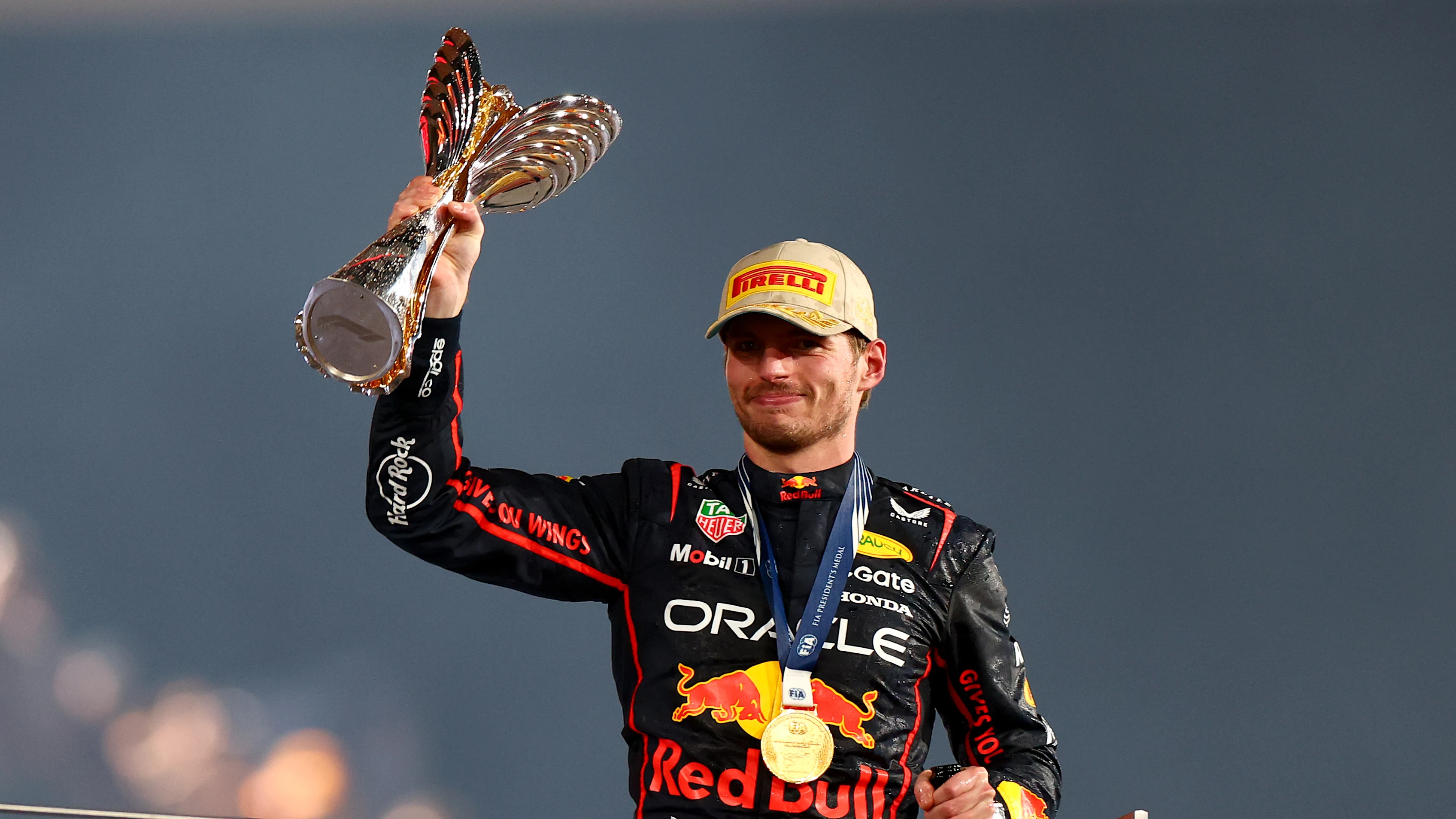 ABU DHABI, UNITED ARAB EMIRATES - DECEMBER 07: Race winner Max Verstappen of the Netherlands and