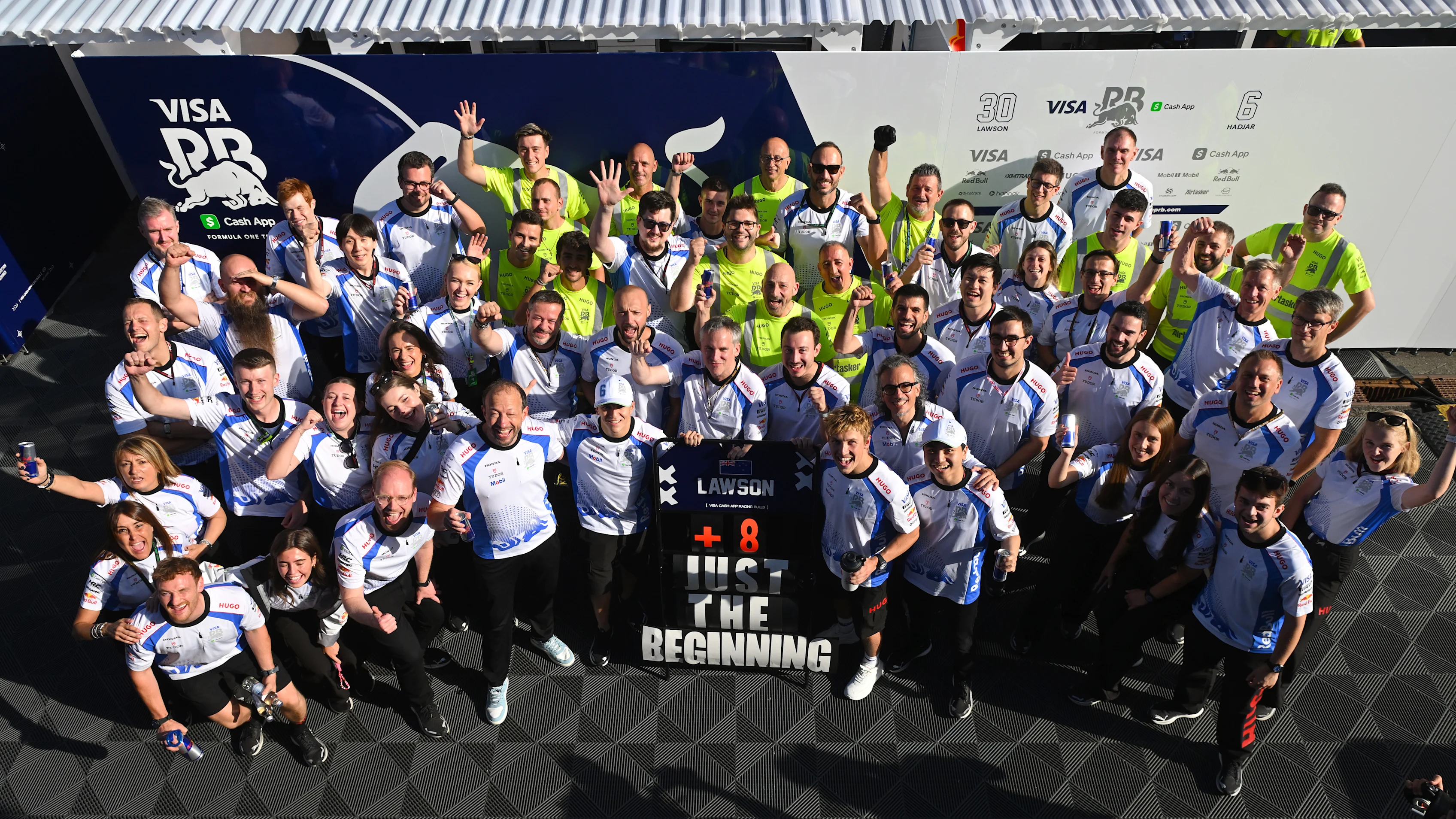 SPIELBERG, AUSTRIA - JUNE 29: Twelfth placed Isack Hadjar of France and Visa Cash App Racing Bulls Sixth placed Liam Lawson of New Zealand and Visa Cash App Racing Bulls Peter Bayer, CEO of Visa Cash App Racing Bulls Laurent Mekies, Team Principal of Visa Cash App Racing Bulls and the Visa Cash App Racing Bulls team celebrate during the F1 Grand Prix of Austria at Red Bull Ring on June 29, 2025 in Spielberg, Austria. (Photo by Rudy Carezzevoli/Getty Images)