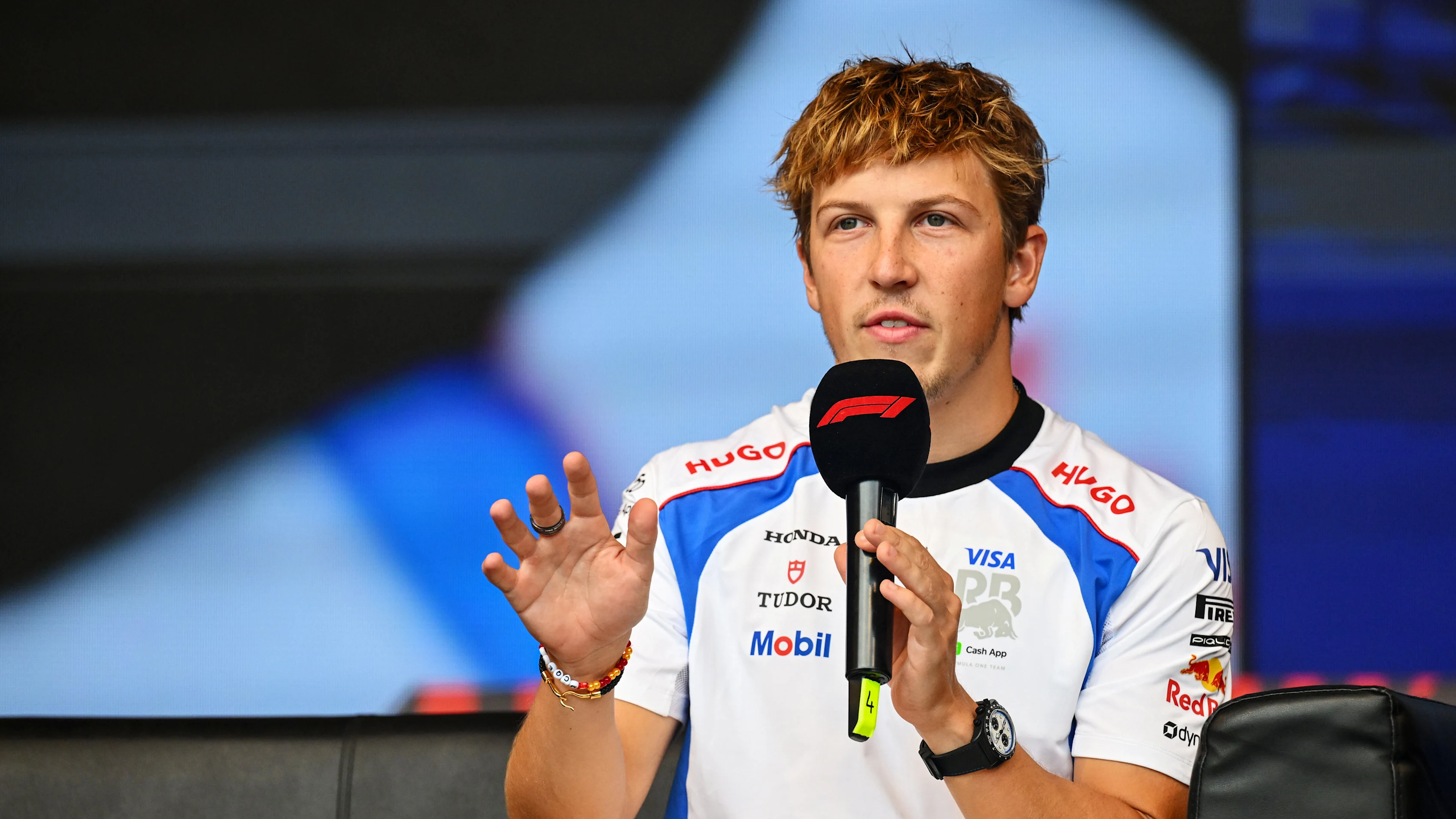 BAKU, AZERBAIJAN - SEPTEMBER 19: Liam Lawson of New Zealand and Visa Cash App Racing Bulls talks on