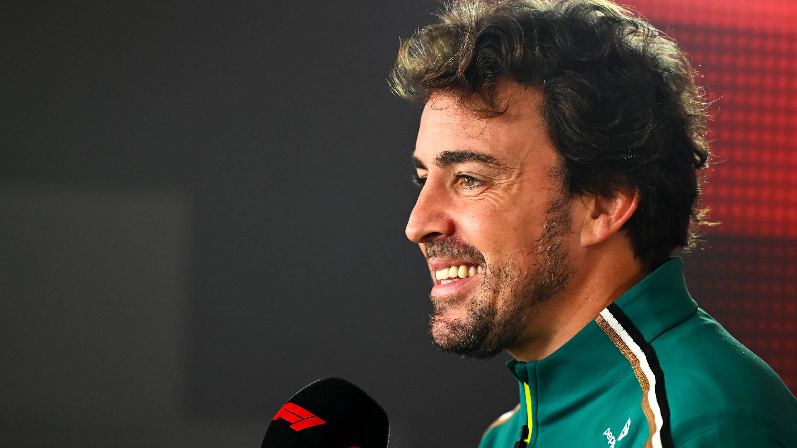 BAKU, AZERBAIJAN - SEPTEMBER 18: Fernando Alonso of Spain and Aston Martin F1 Team talks to the