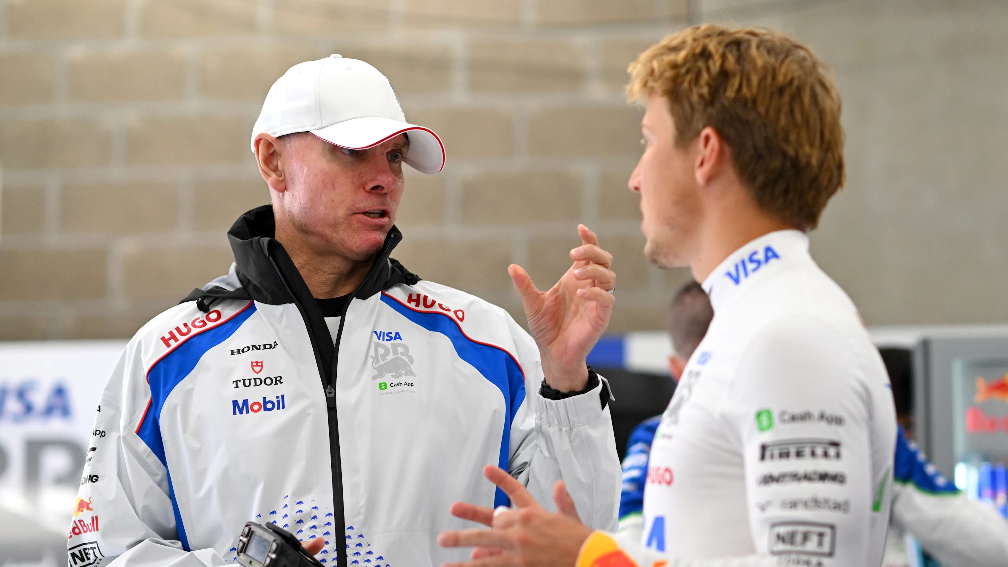 SPA, BELGIUM - JULY 27: Alan Permane, Team Principal of Visa Cash App Racing Bulls and Liam Lawson