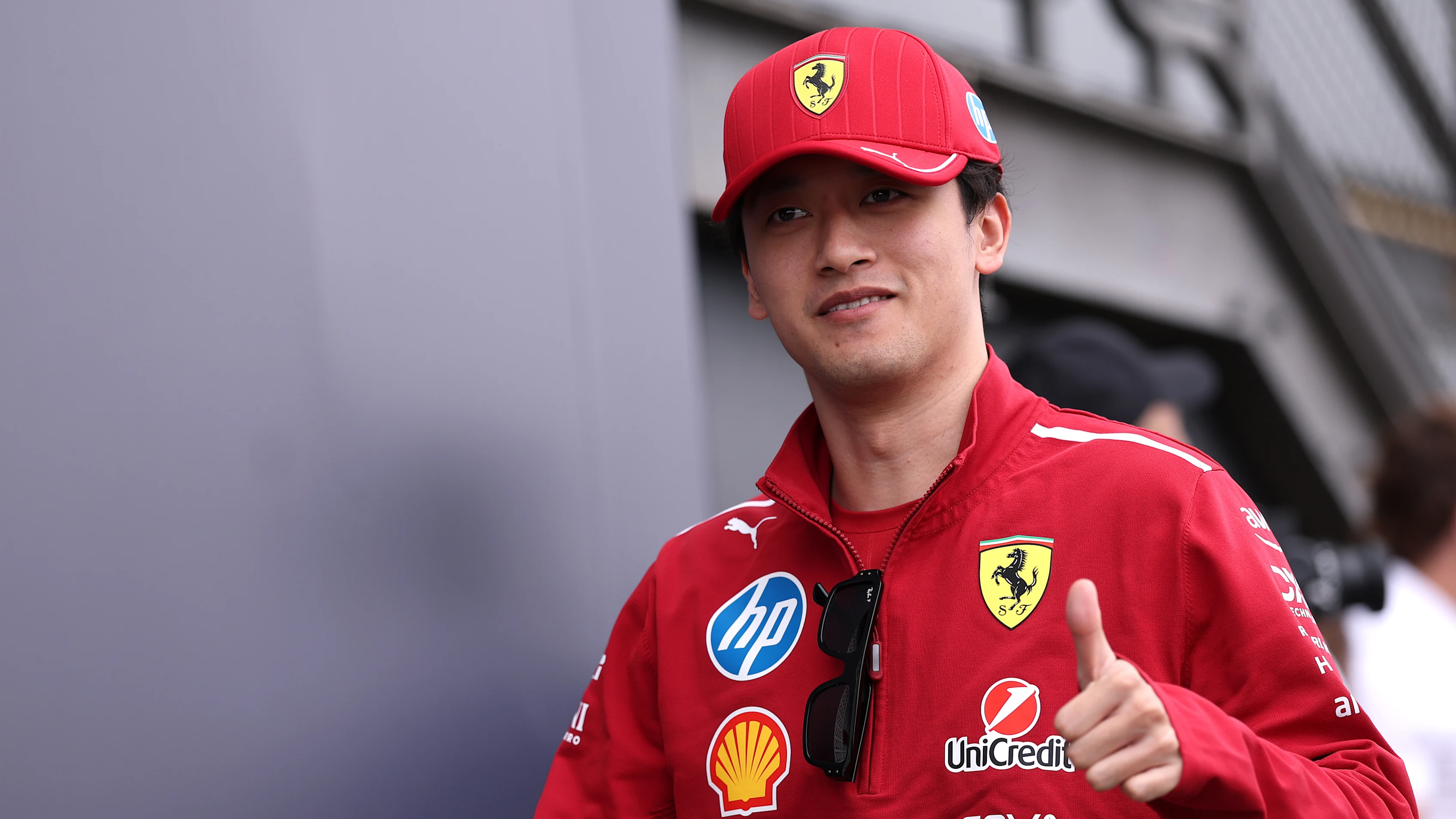 SAO PAULO, BRAZIL - NOVEMBER 06: Zhou Guanyu of China and Scuderia Ferrari arrives in the Paddock