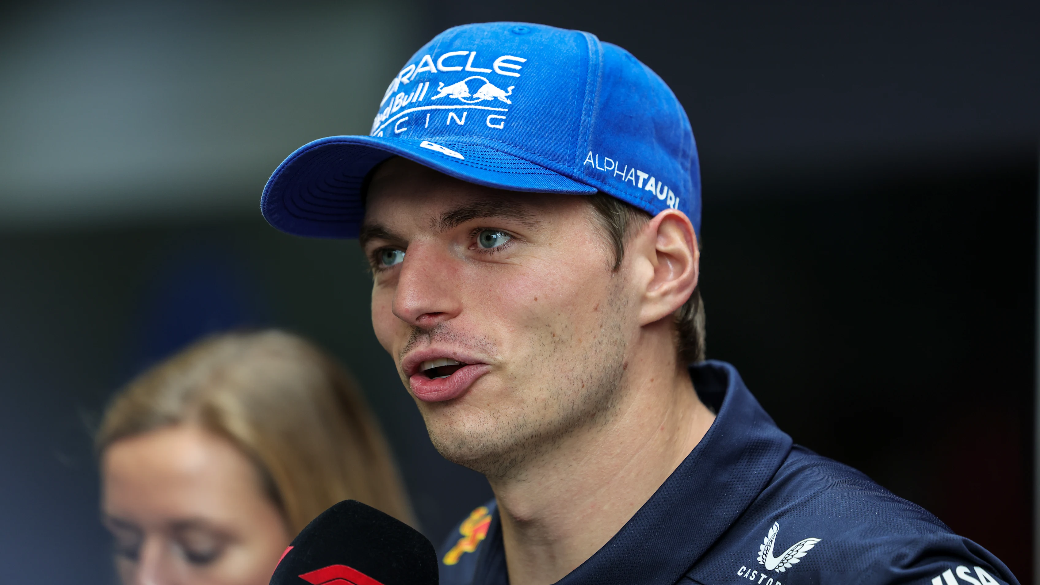 SAO PAULO, BRAZIL - NOVEMBER 06: Max Verstappen of the Netherlands and Oracle Red Bull Racing talks