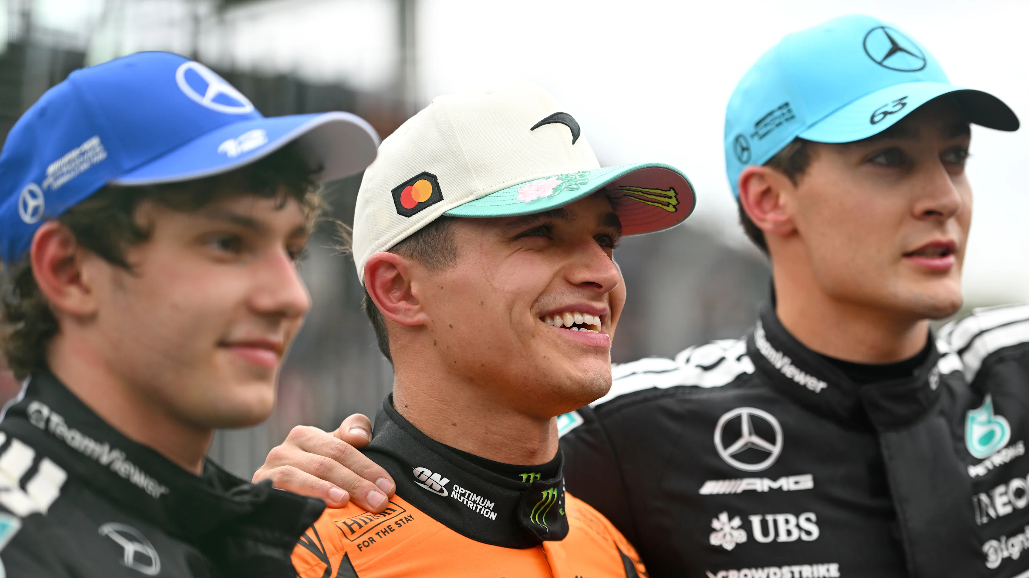 SAO PAULO, BRAZIL - NOVEMBER 08: Sprint winner Lando Norris of Great Britain and McLaren, Second placed Andrea Kimi Antonelli of Italy and Mercedes AMG Petronas F1 Team, and Third placed George Russell of Great Britain and Mercedes AMG Petronas F1 Team pose for a photo during the Sprint ahead of the F1 Grand Prix of Brazil at Autodromo Jose Carlos Pace on November 08, 2025 in Sao Paulo, Brazil. (Photo by Rudy Carezzevoli/Getty Images)