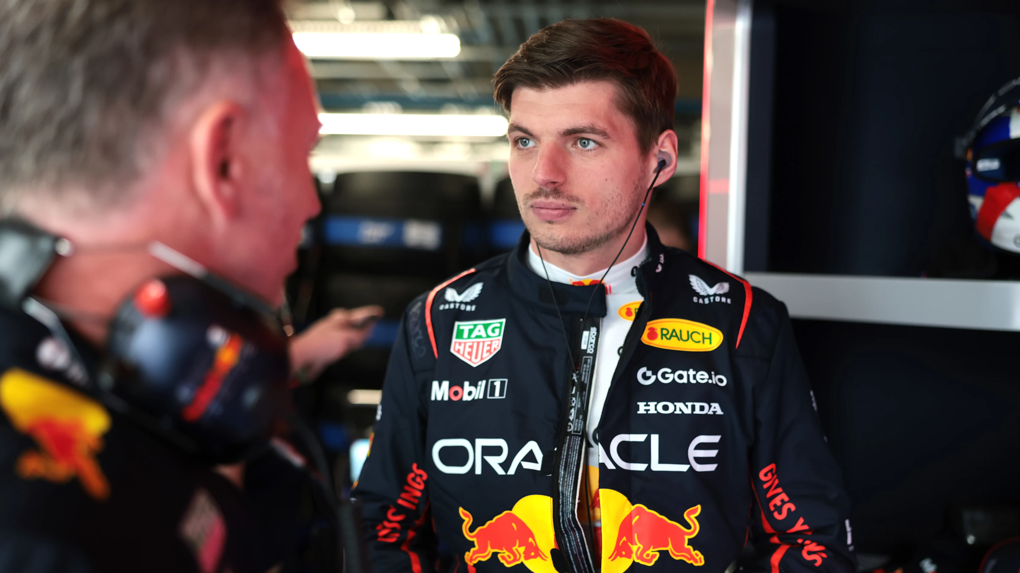 MONTREAL, QUEBEC - JUNE 13: Max Verstappen of the Netherlands and Oracle Red Bull Racing talks with