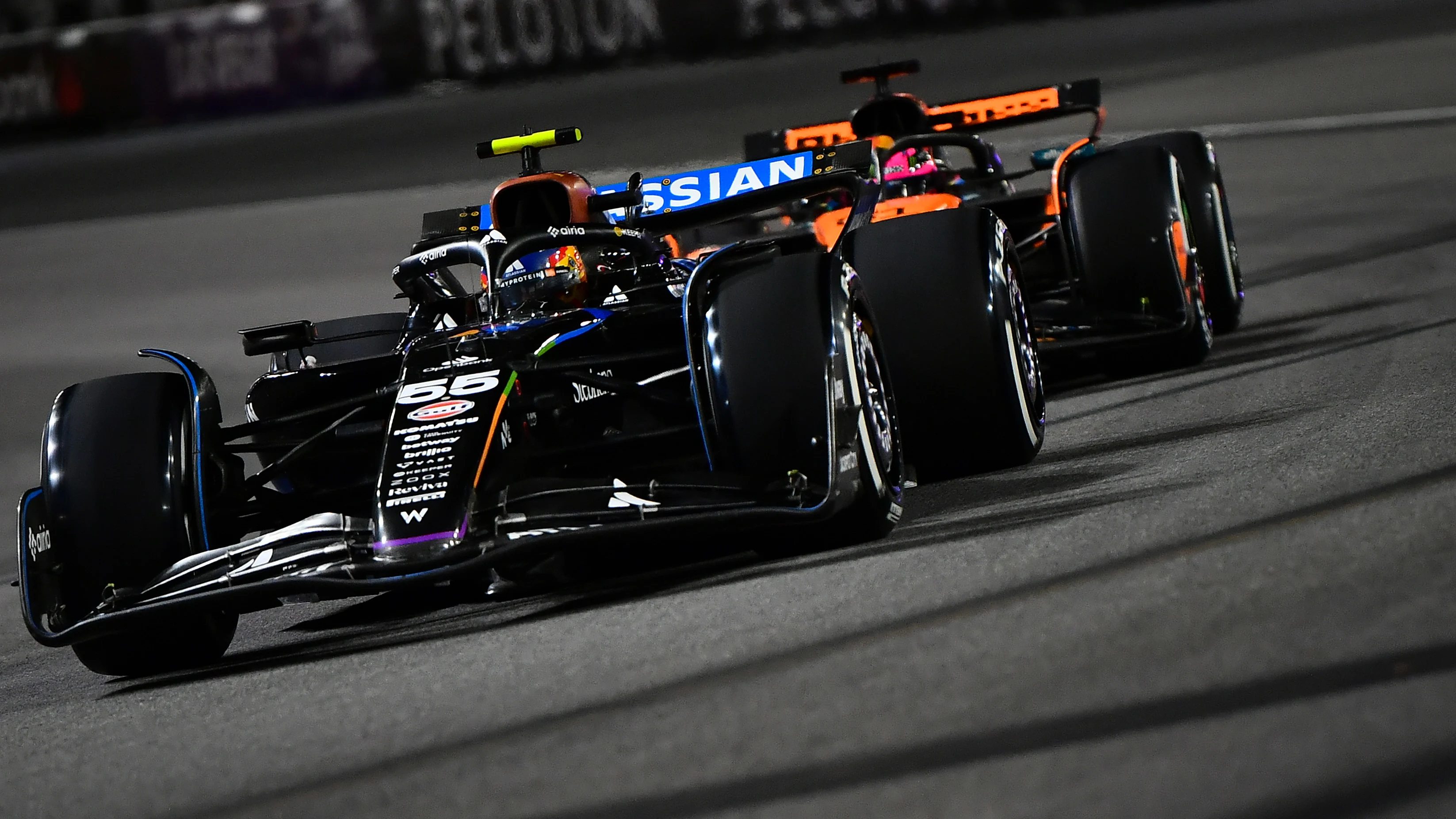 LAS VEGAS, NEVADA - NOVEMBER 22: Carlos Sainz of Spain driving the (55) Williams FW47 Mercedes leads Oscar Piastri of Australia driving the (81) McLaren MCL39 Mercedes on track during the F1 Grand Prix of Las Vegas at Las Vegas Strip Circuit on November 22, 2025 in Las Vegas, Nevada. (Photo by James Sutton - Formula 1/Formula 1 via Getty Images)