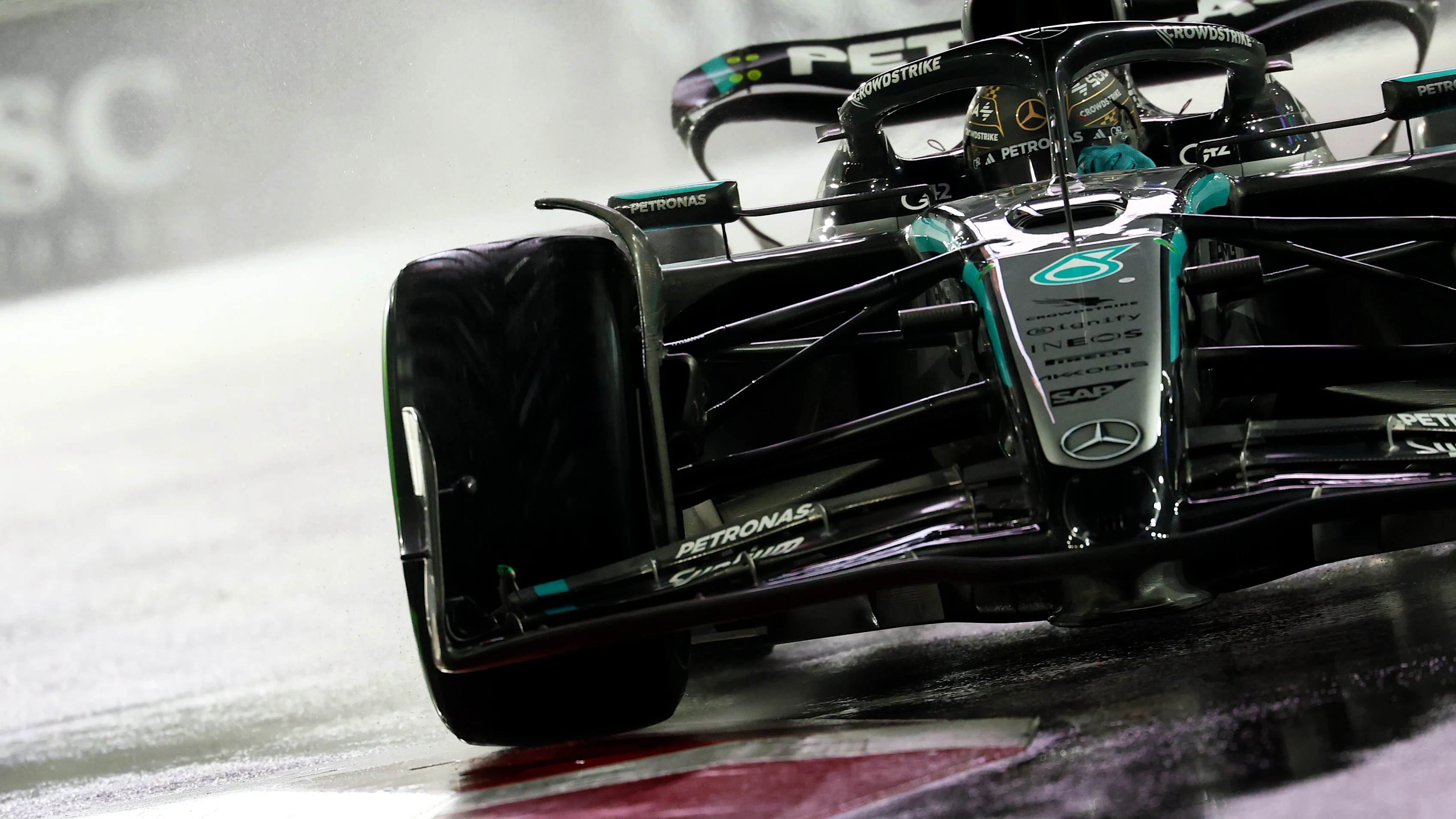 LAS VEGAS, NEVADA - NOVEMBER 21: George Russell of Great Britain driving the (63) Mercedes AMG Petronas F1 Team W16 on track during qualifying ahead of the F1 Grand Prix of Las Vegas at Las Vegas Strip Circuit on November 21, 2025 in Las Vegas, Nevada. (Photo by Clive Rose/Getty Images)