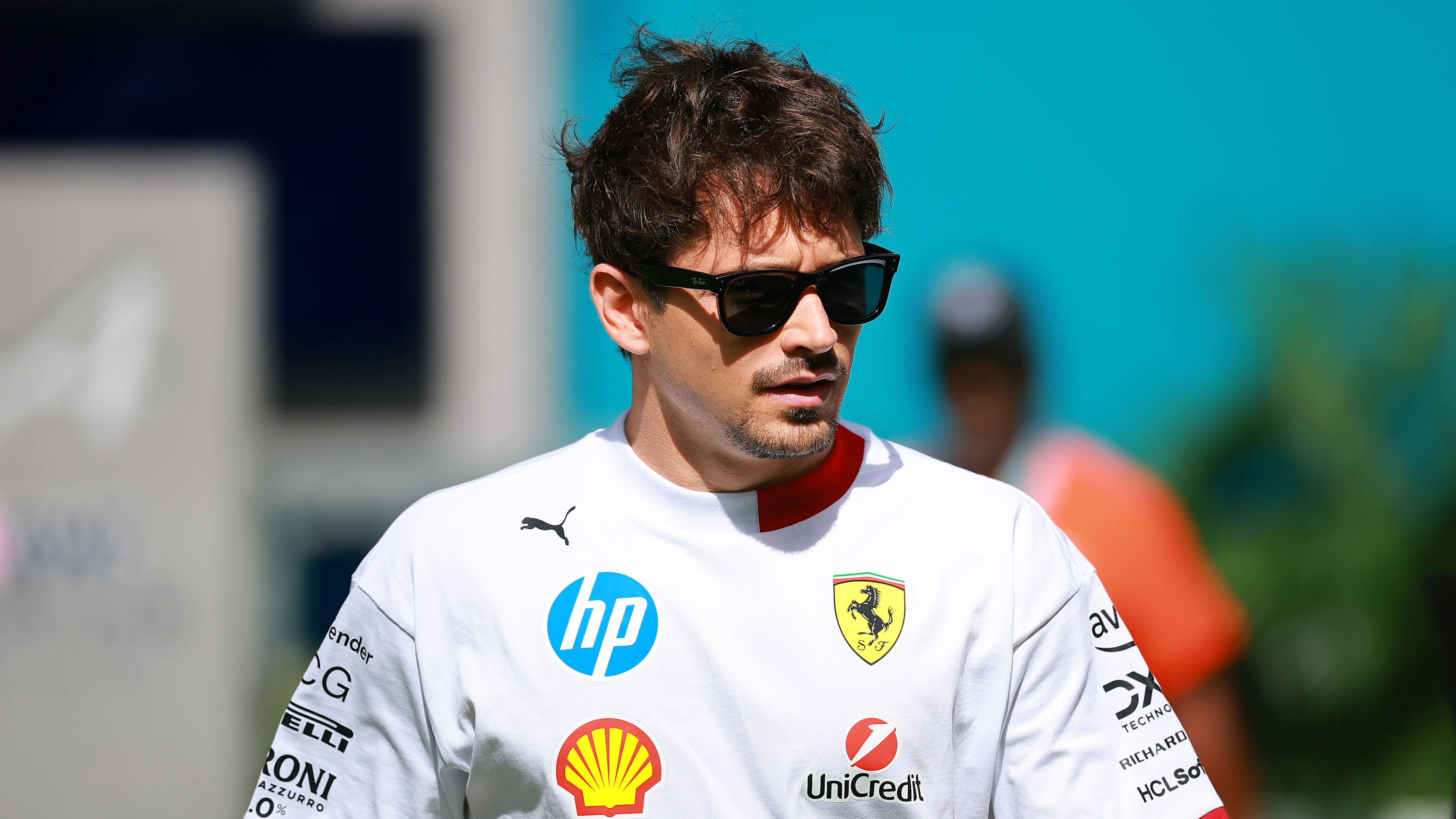 MIAMI, FLORIDA - MAY 01: Charles Leclerc of Monaco and Scuderia Ferrari arrives in the Paddock