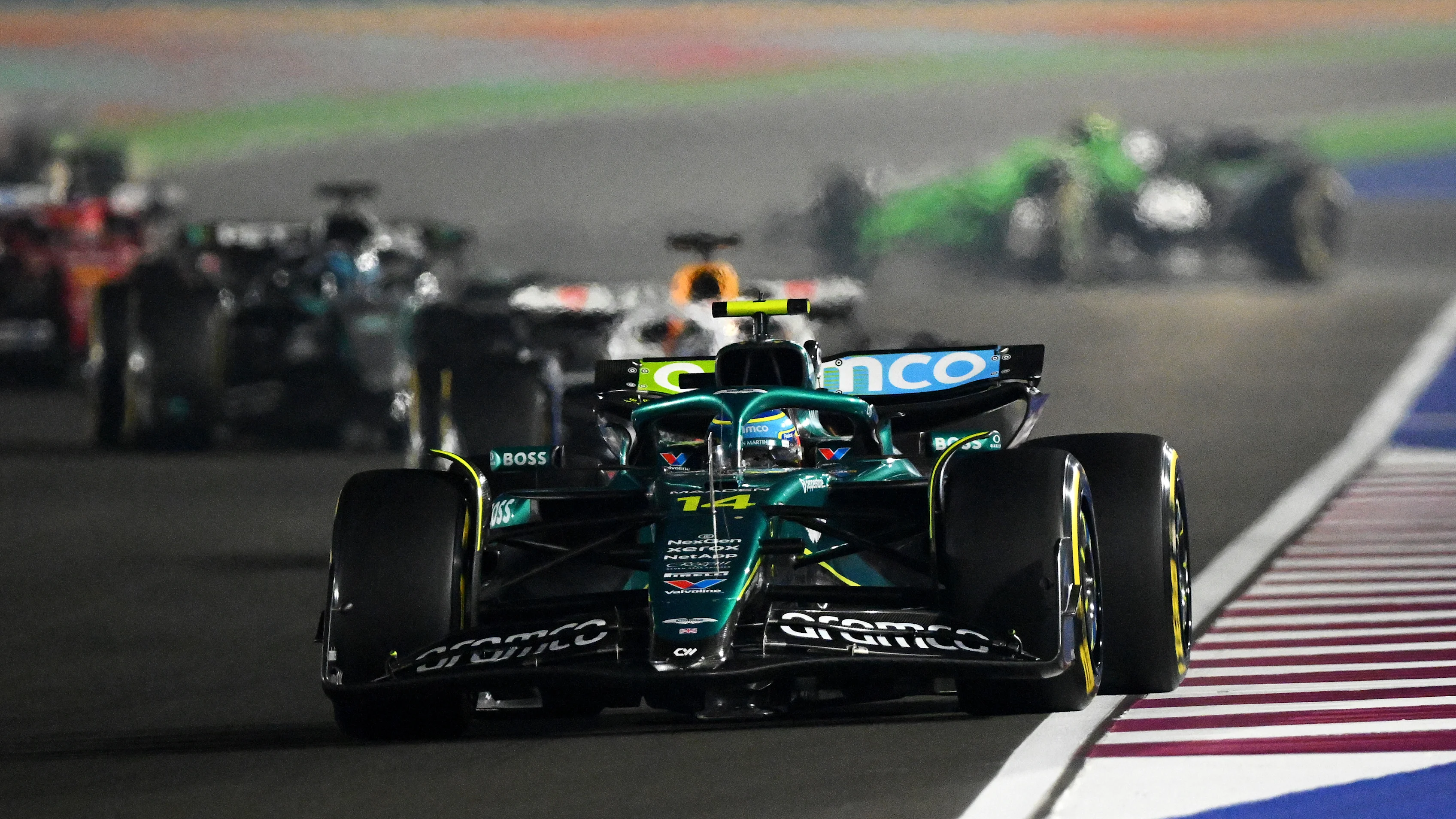 LUSAIL CITY, QATAR - NOVEMBER 30: Fernando Alonso of Spain driving the (14) Aston Martin F1 Team AMR25 Mercedes on track during the F1 Grand Prix of Qatar at Lusail International Circuit on November 30, 2025 in Lusail City, Qatar. (Photo by Clive Mason/Getty Images)