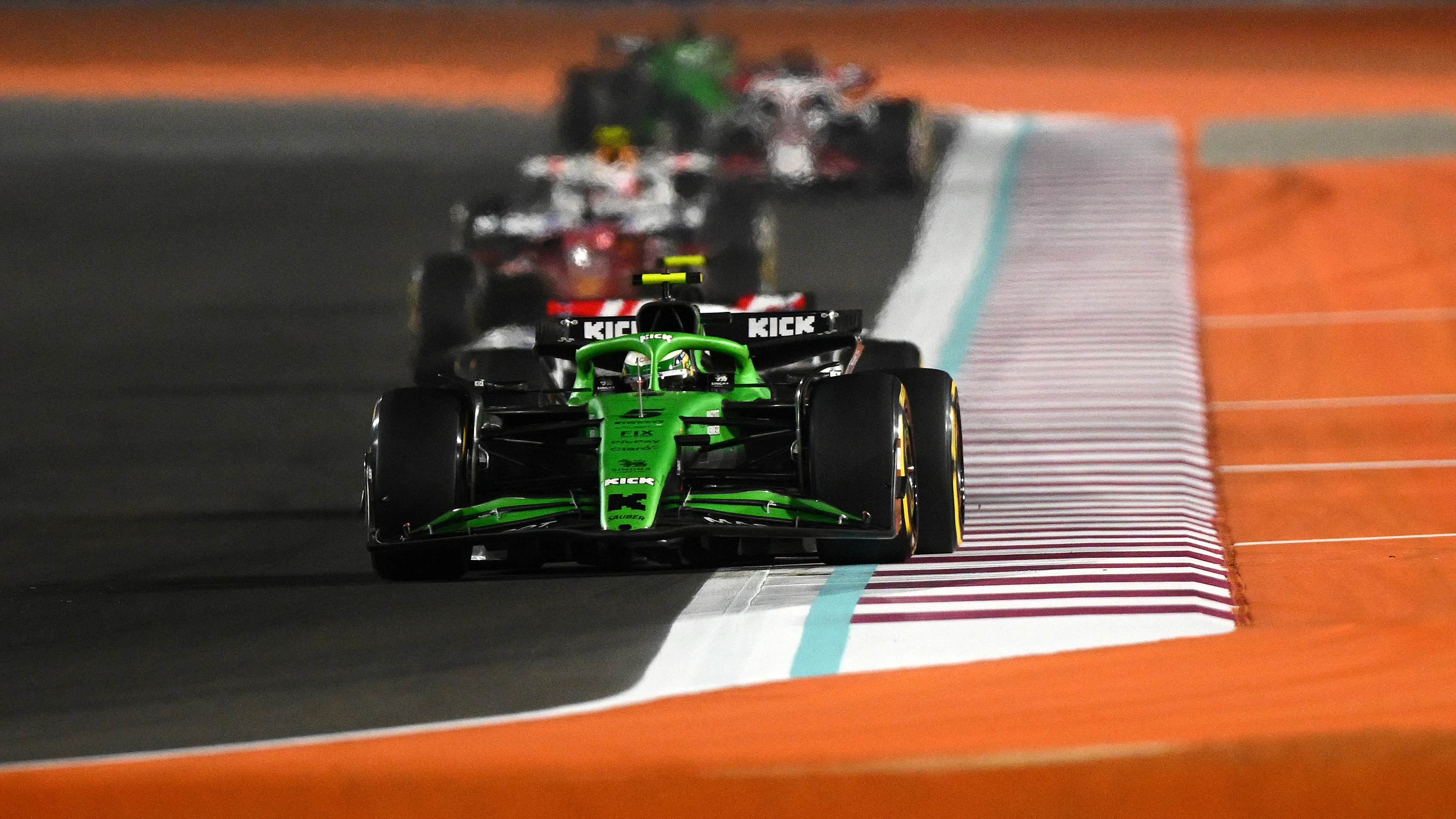 LUSAIL CITY, QATAR - NOVEMBER 29: Gabriel Bortoleto of Brazil driving the (5) Kick Sauber C45 Ferrari leads Oliver Bearman of Great Britain driving the (87) Haas F1 VF-25 Ferrari on track during the Sprint ahead of the F1 Grand Prix of Qatar at Lusail International Circuit on November 29, 2025 in Lusail City, Qatar. (Photo by Clive Mason/Getty Images)