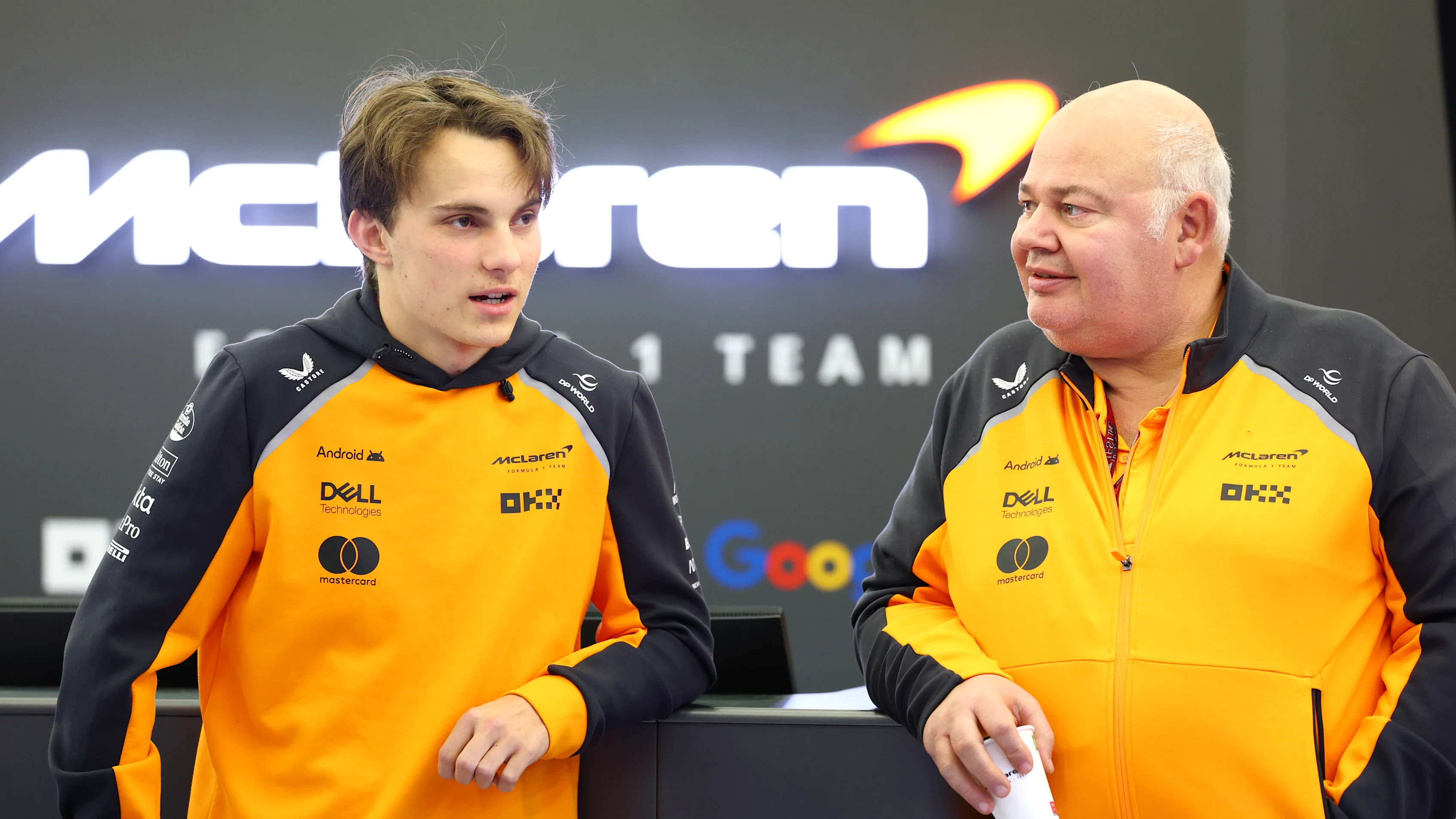 BAHRAIN, BAHRAIN - FEBRUARY 26: Oscar Piastri of Australia and McLaren and Rob Marshall, Chief