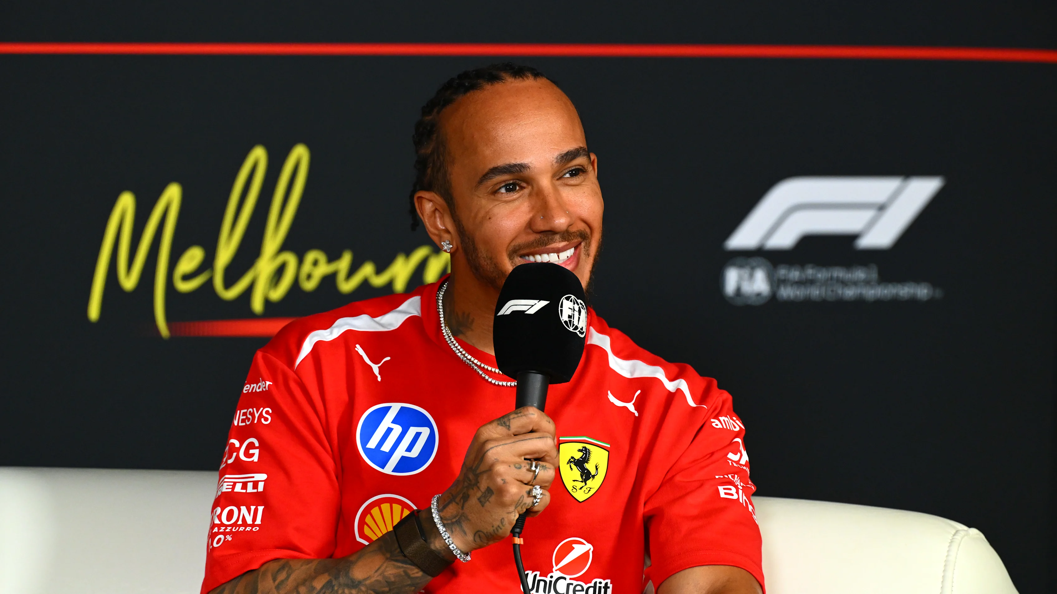 MELBOURNE, AUSTRALIA - MARCH 05: Lewis Hamilton of Great Britain and Scuderia Ferrari speaks in the
