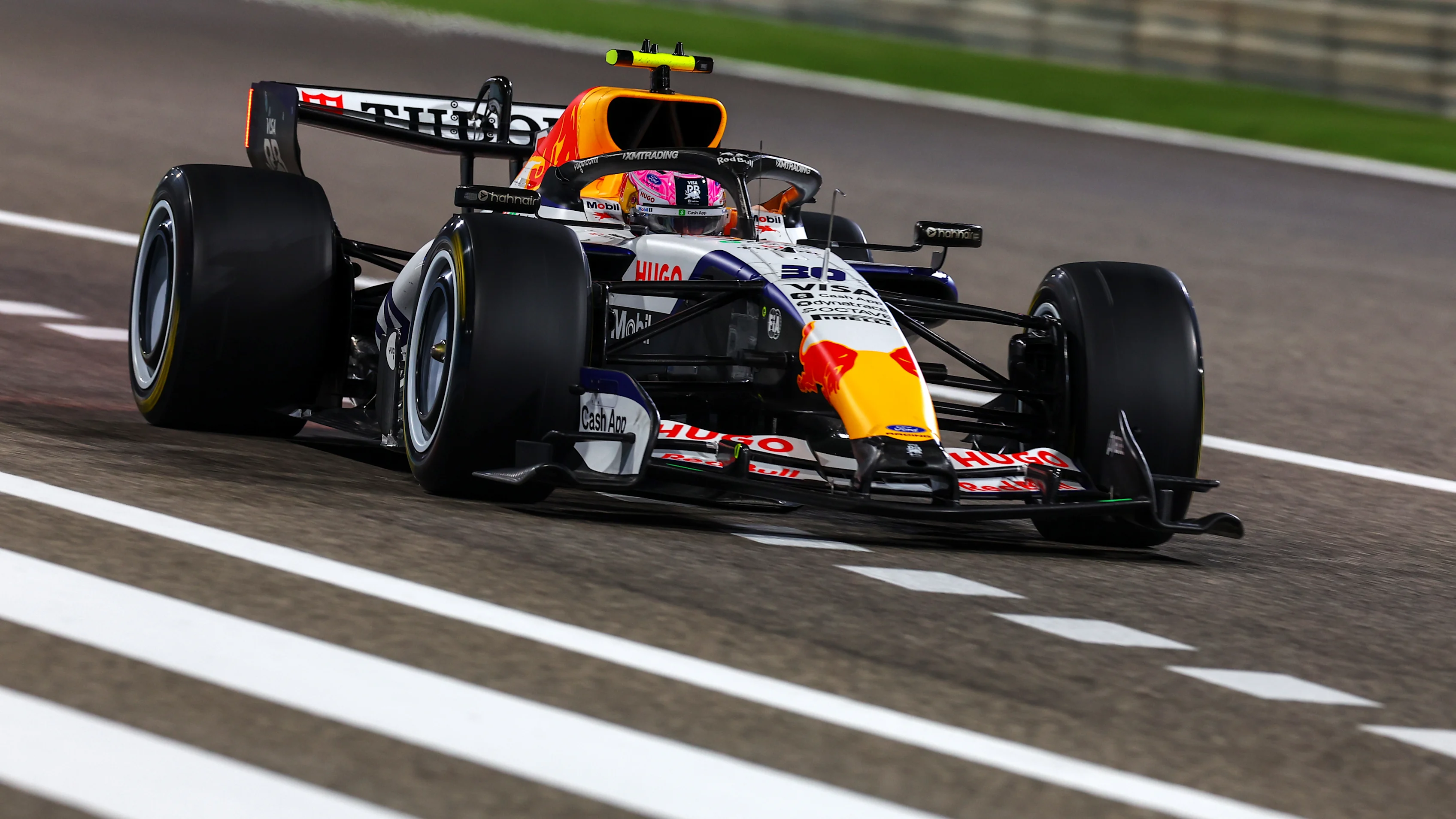 BAHRAIN, BAHRAIN - FEBRUARY 19: Liam Lawson of New Zealand driving the (30) Visa Cash App Racing