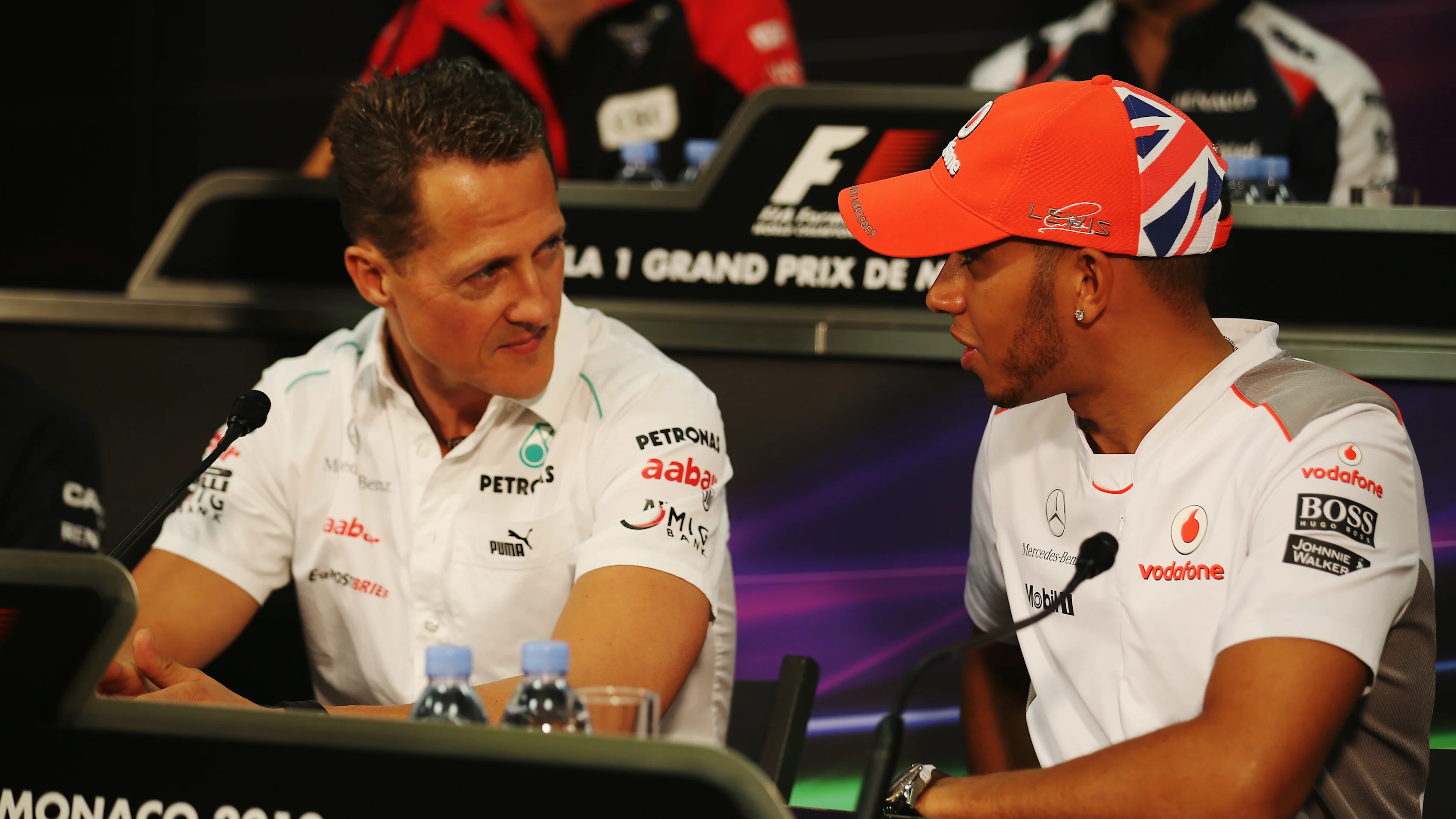 MONTE CARLO, MONACO - MAY 23:  Lewis Hamilton (R) of Great Britain and McLaren talks with Michael