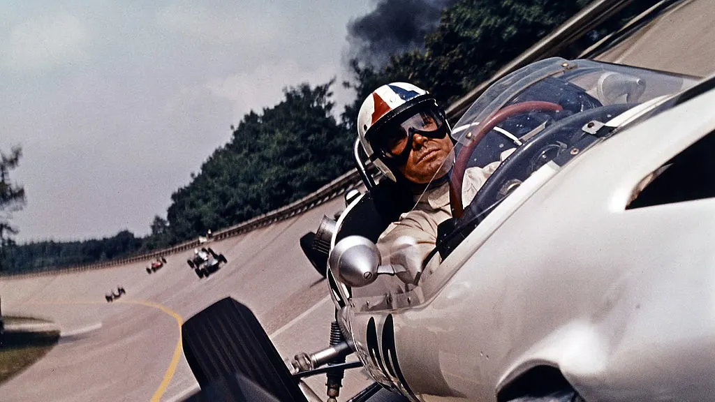 James Garner races in a scene from the film 'Grand Prix', 1966. (Photo by Metro-Goldwyn-Mayer/Getty