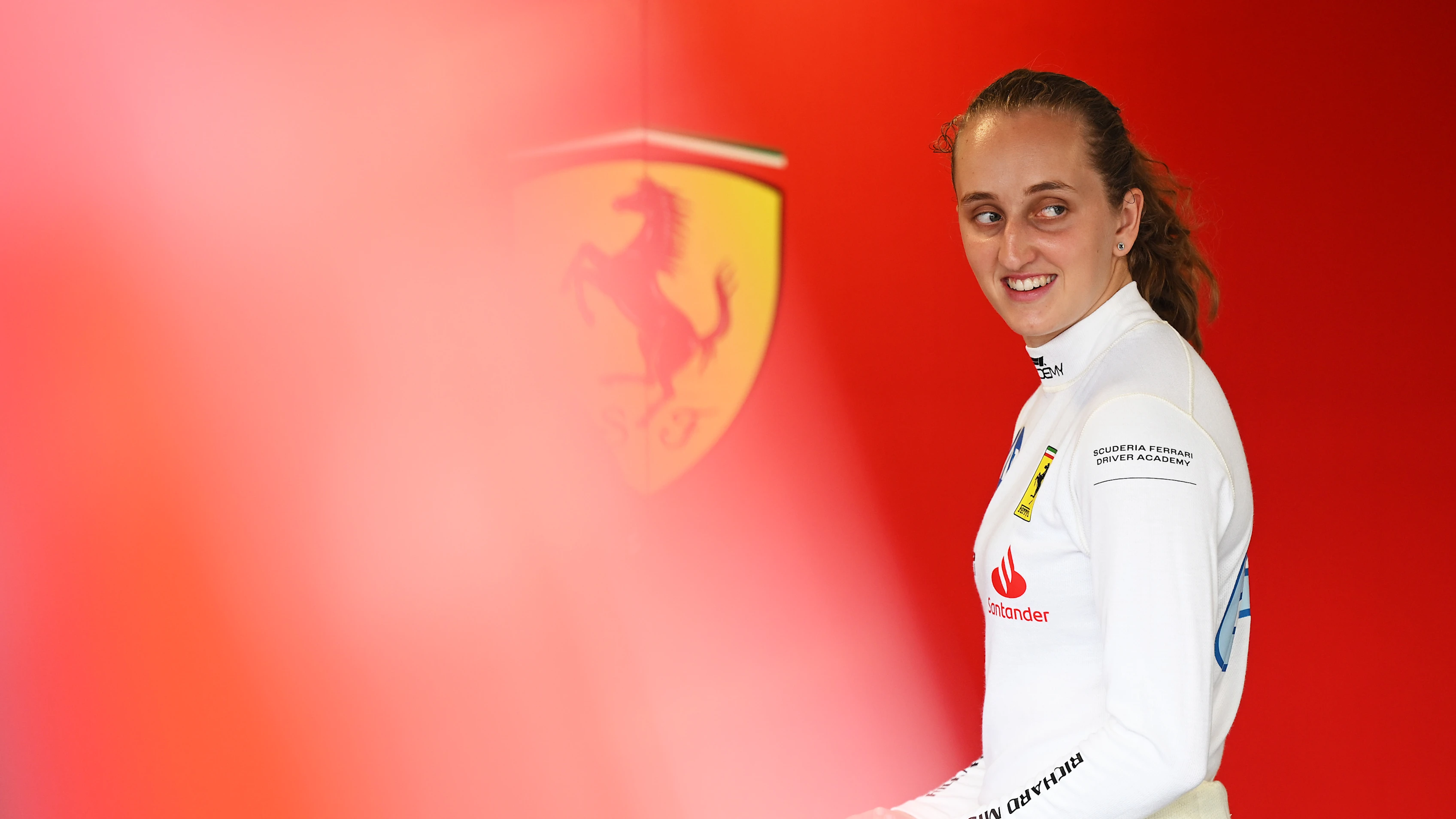 MIAMI, FLORIDA - MAY 03: Maya Weug of Netherlands and PREMA Racing (64) looks on in the garage