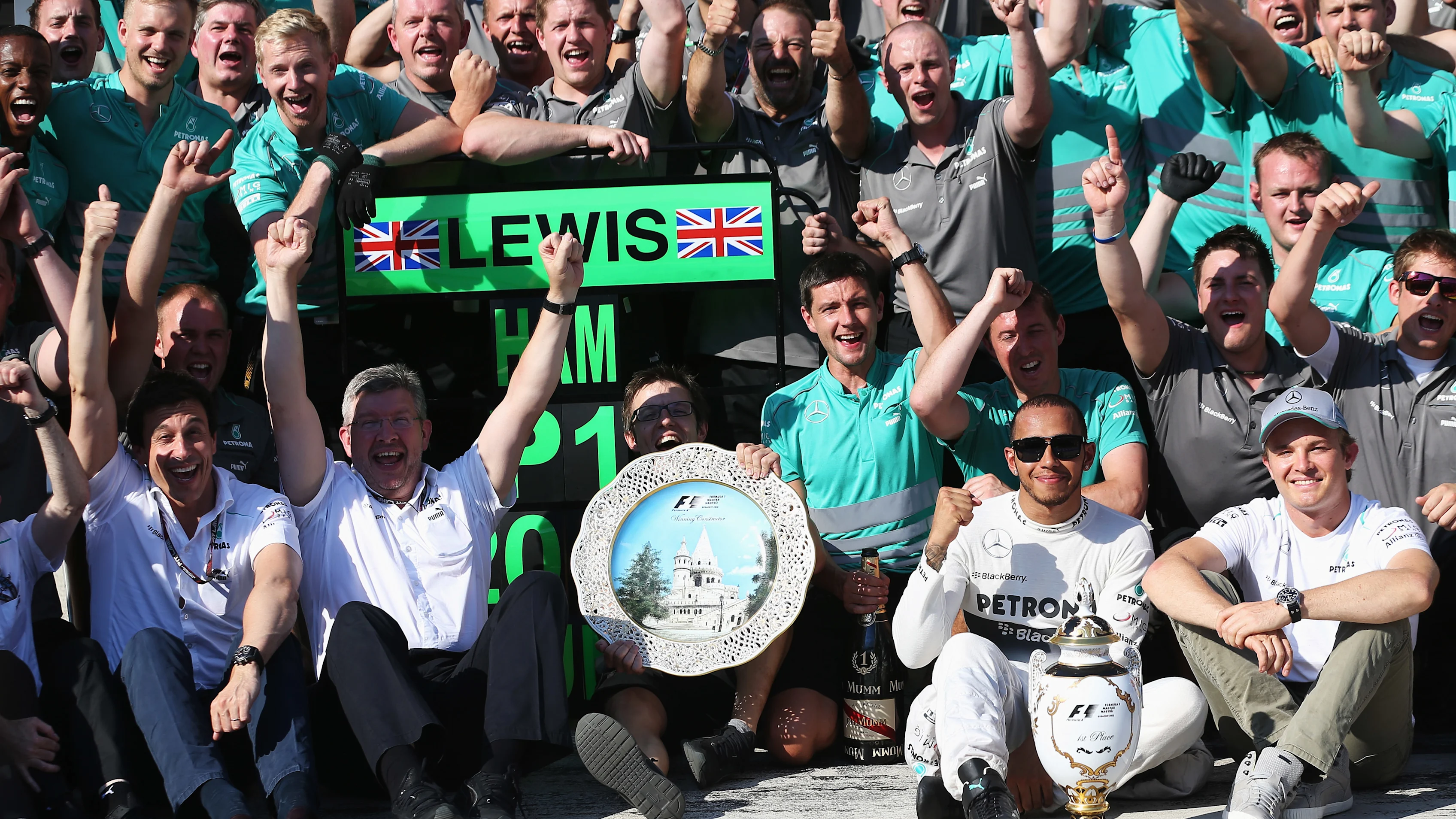 BUDAPEST, HUNGARY - JULY 28:  Lewis Hamilton (2nd right) of Great Britain and Mercedes GP