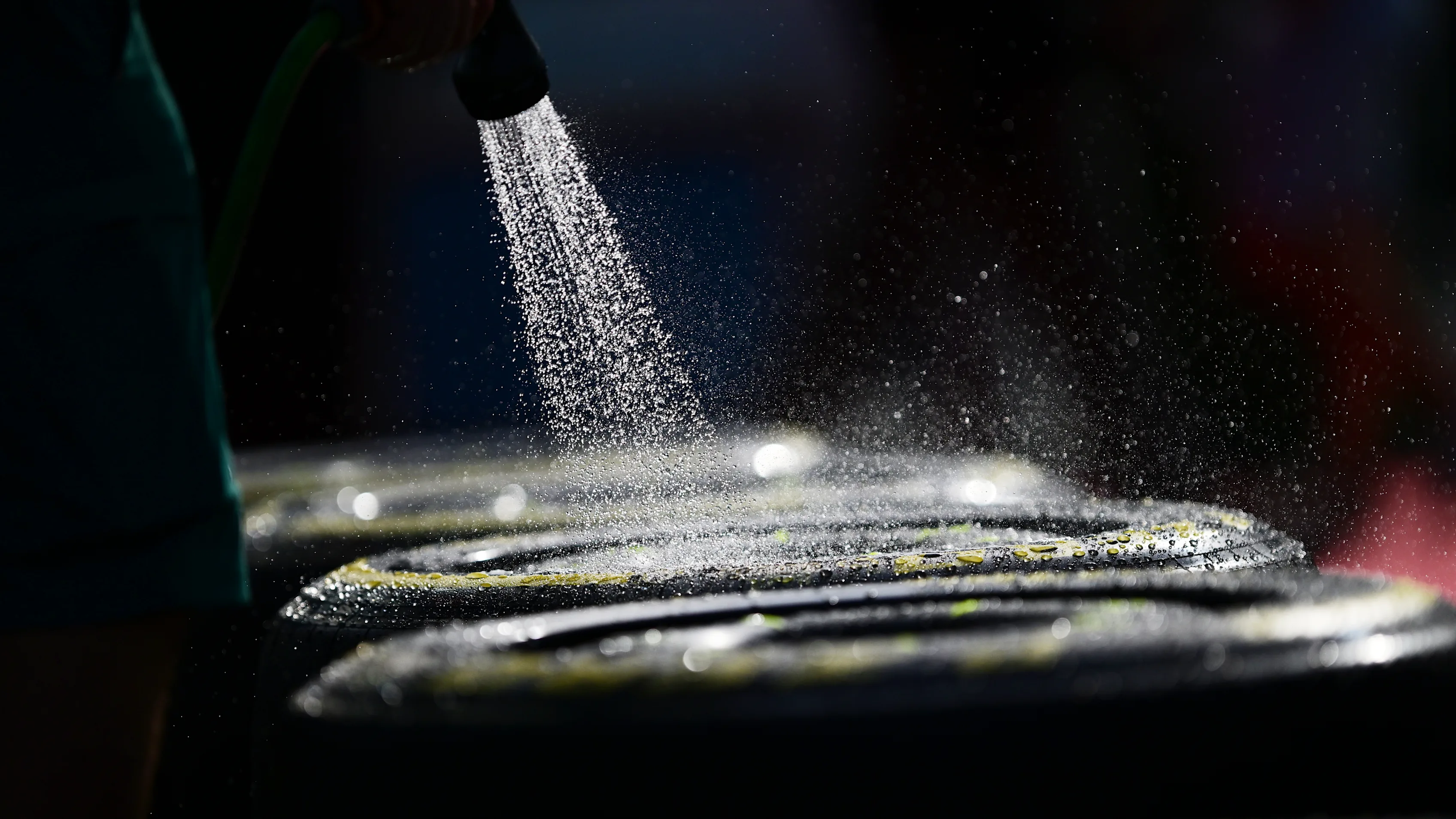 SPIELBERG, AUSTRIA - JUNE 29: Tyres are washed in the Paddock during qualifying ahead of the F1