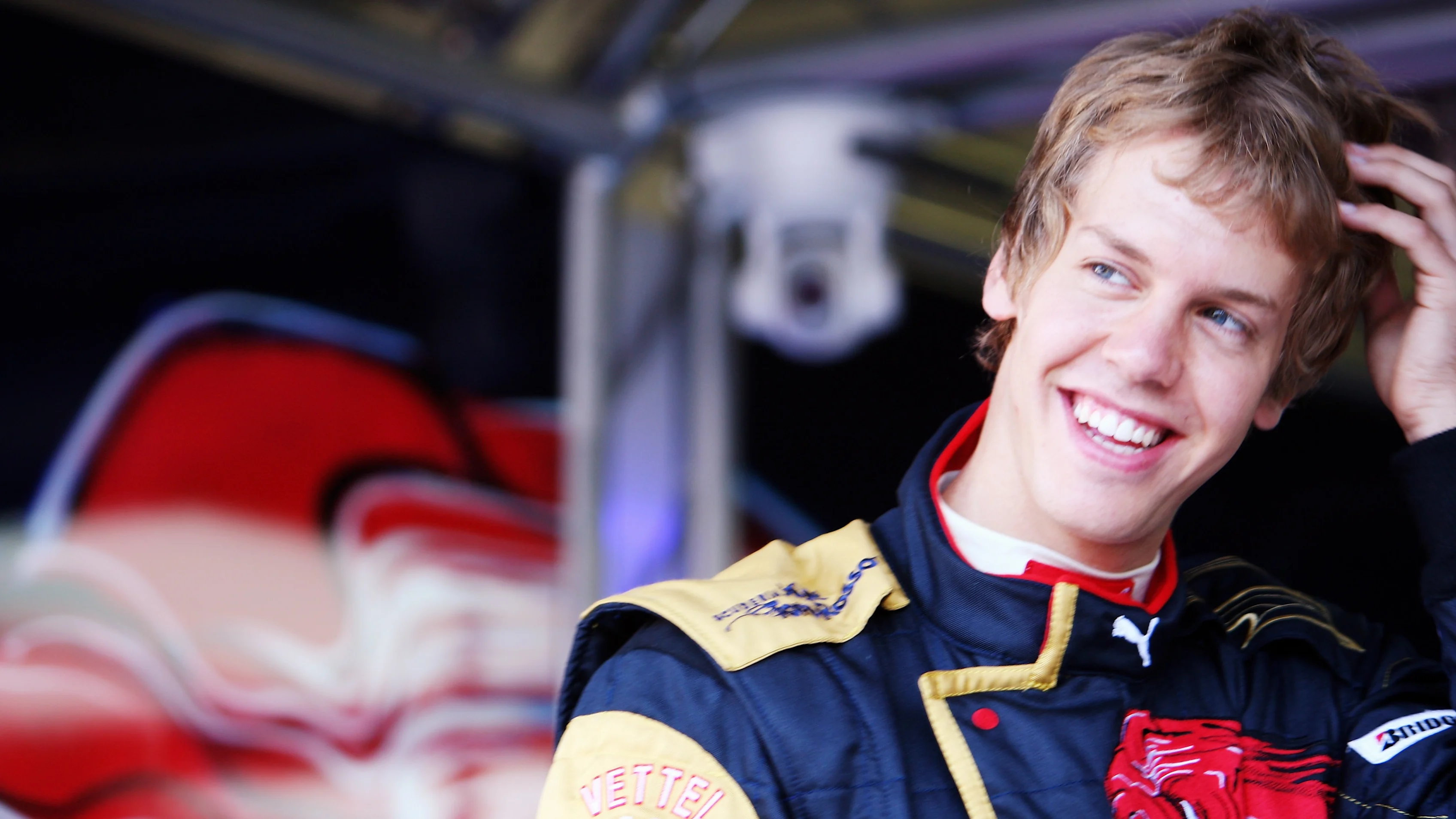 BUDAPEST, HUNGARY - AUGUST 03:  Sebastian Vettel of Germany and Scuderia Toro Rosso prepares in the