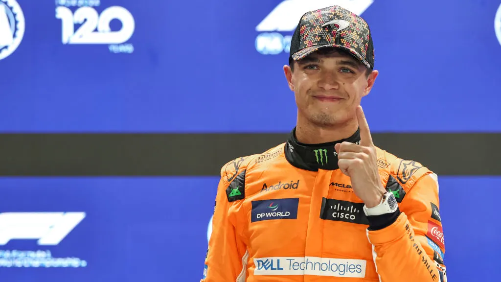 SINGAPORE, SINGAPORE - SEPTEMBER 21: Lando Norris of Great Britain and McLaren F1 Team celebrates