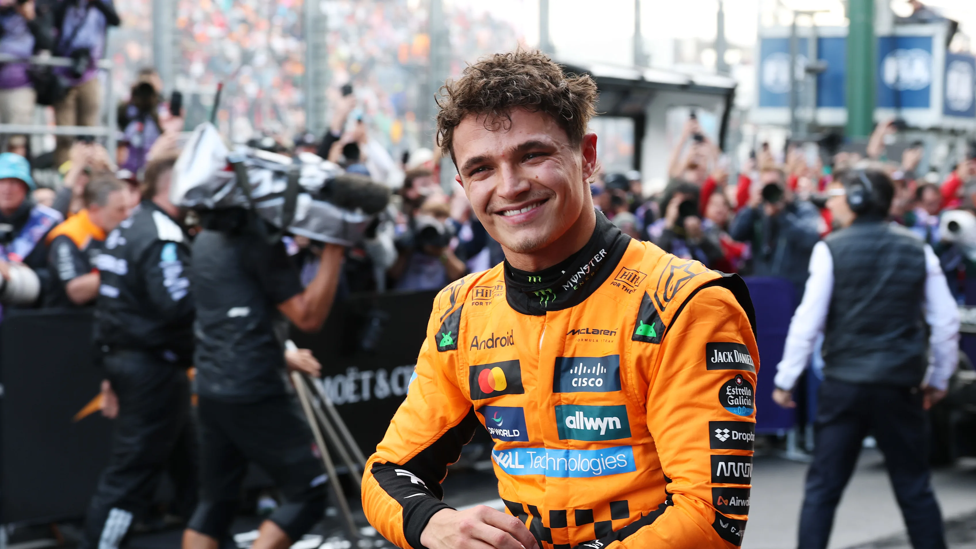MELBOURNE, AUSTRALIA - MARCH 16: Race winner Lando Norris of Great Britain and McLaren celebrates