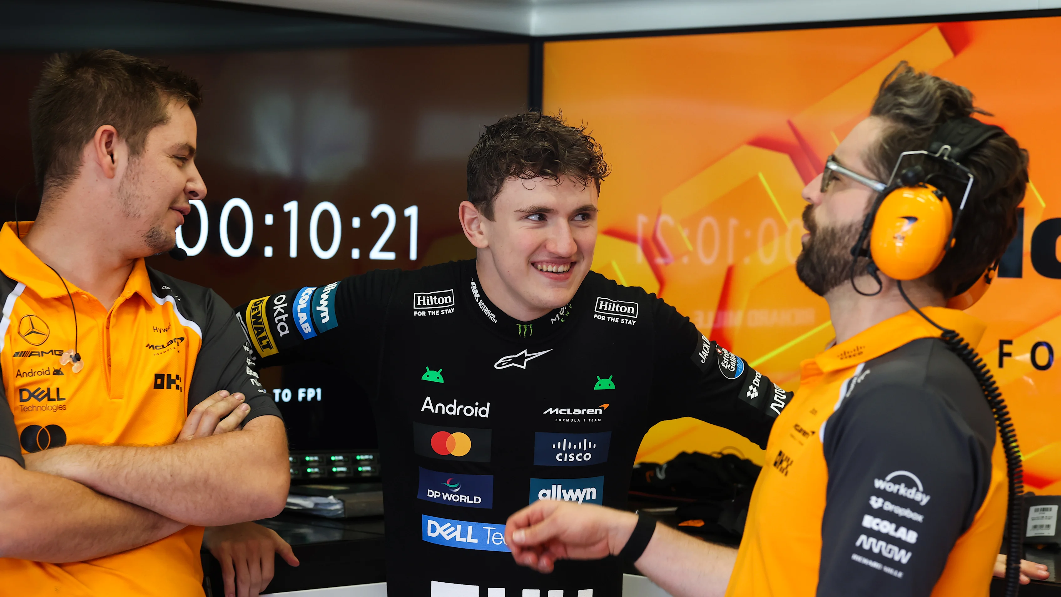 SPIELBERG, AUSTRIA - JUNE 27: Alexander Dunne of Ireland and McLaren talks with team members in the