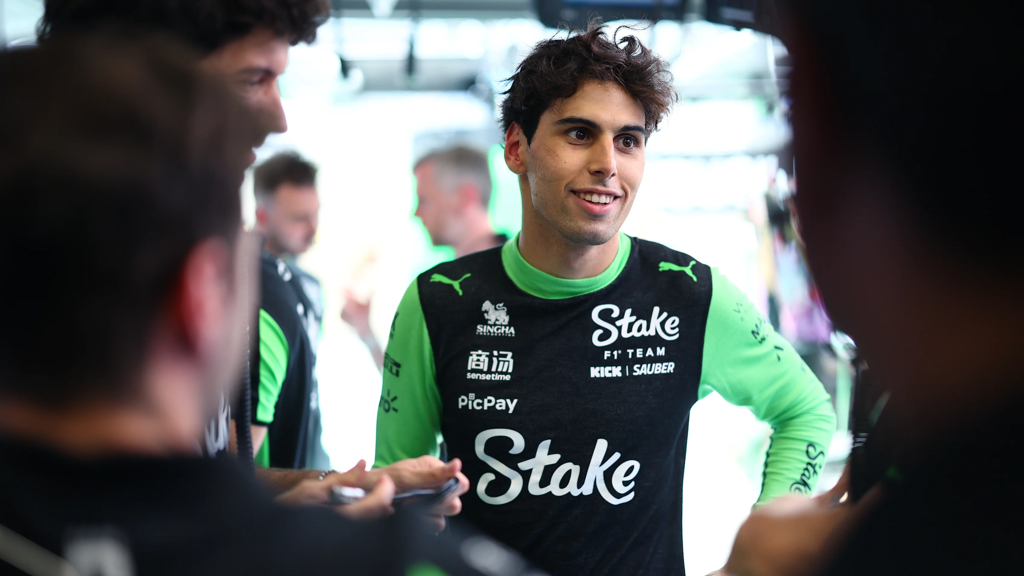 SPIELBERG, AUSTRIA - JUNE 27: Gabriel Bortoleto of Brazil and Stake F1 Team Kick Sauber talks with